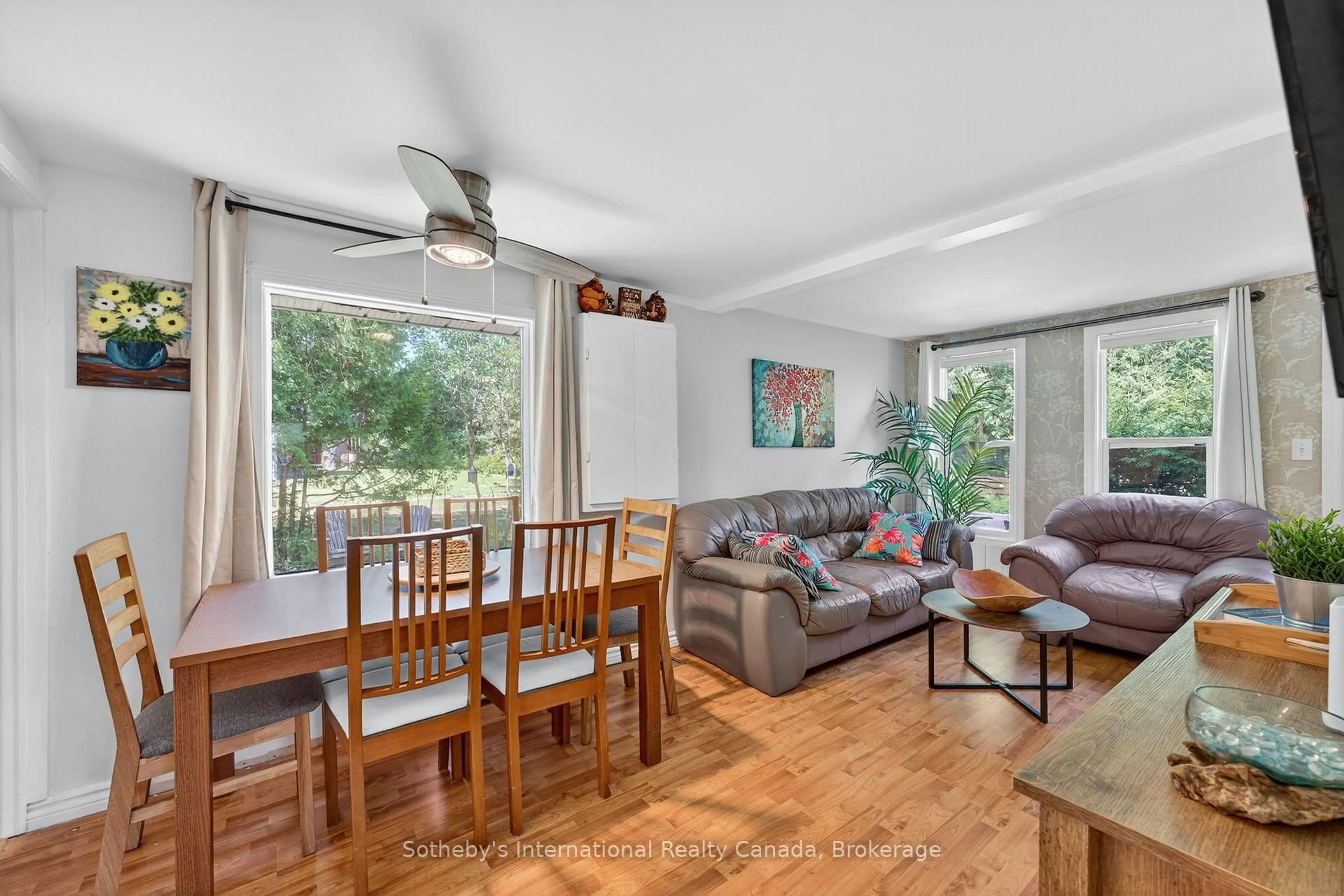 Living room with furniture, wood/laminate floor for 14 Domar Rd, Tiny Ontario L0L 2J0