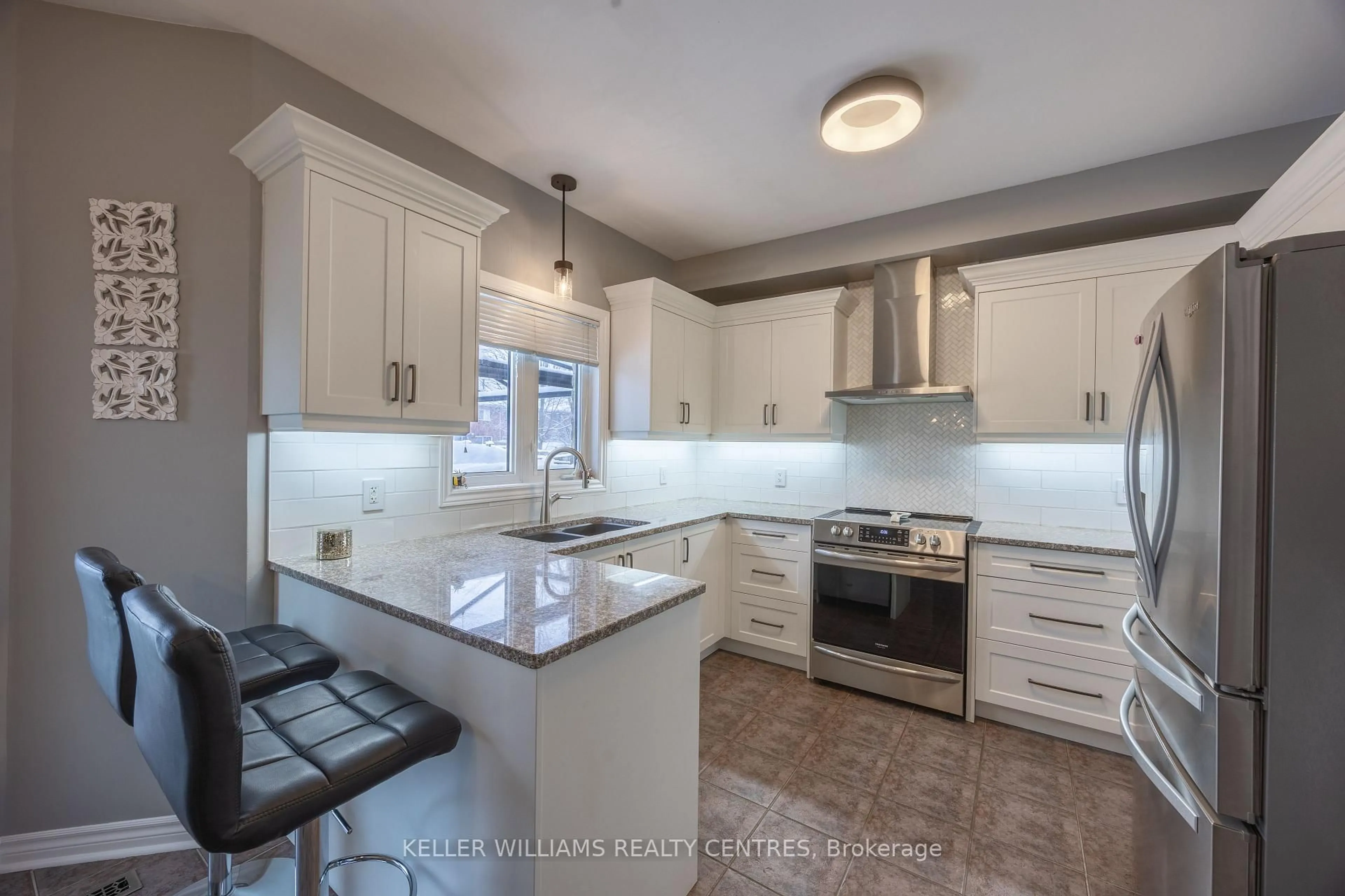 Open concept kitchen, ceramic/tile floor for 13 Surrey Drive Dr, Barrie Ontario L4M 0C5