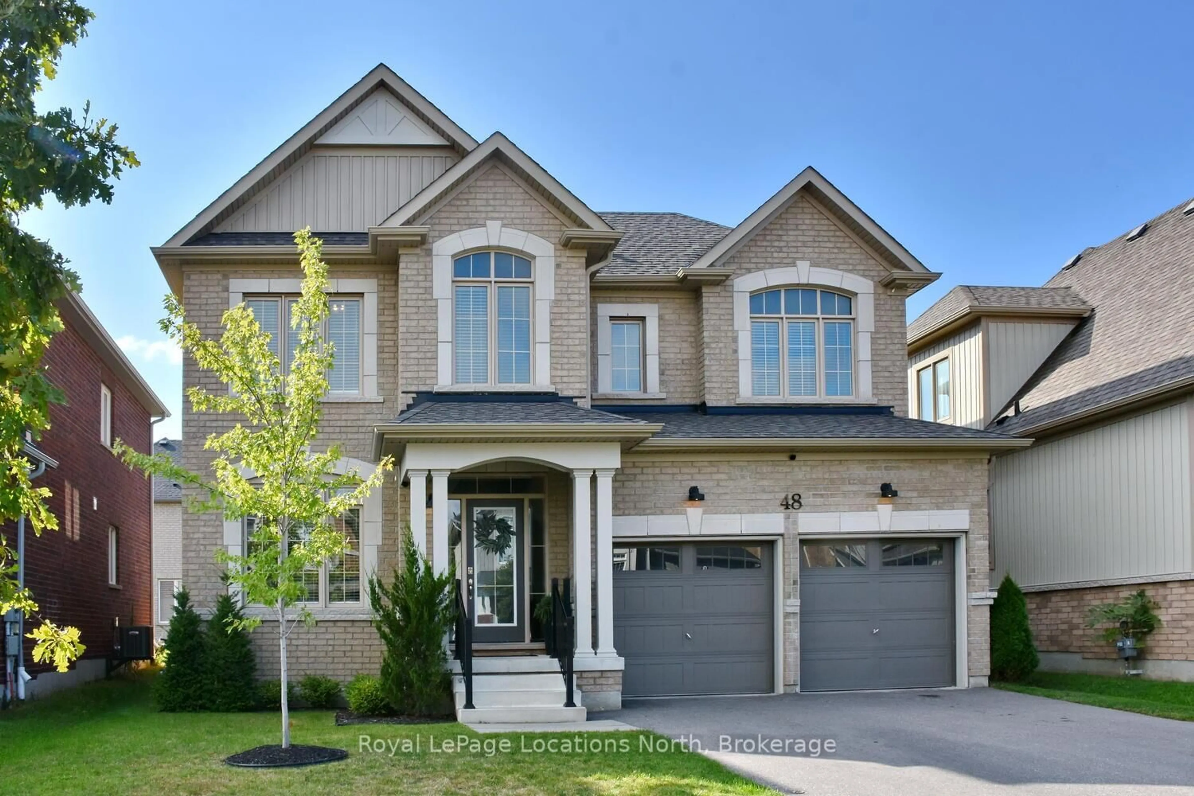 Home with brick exterior material, street for 48 Mclean Ave, Collingwood Ontario L9Y 3Z6