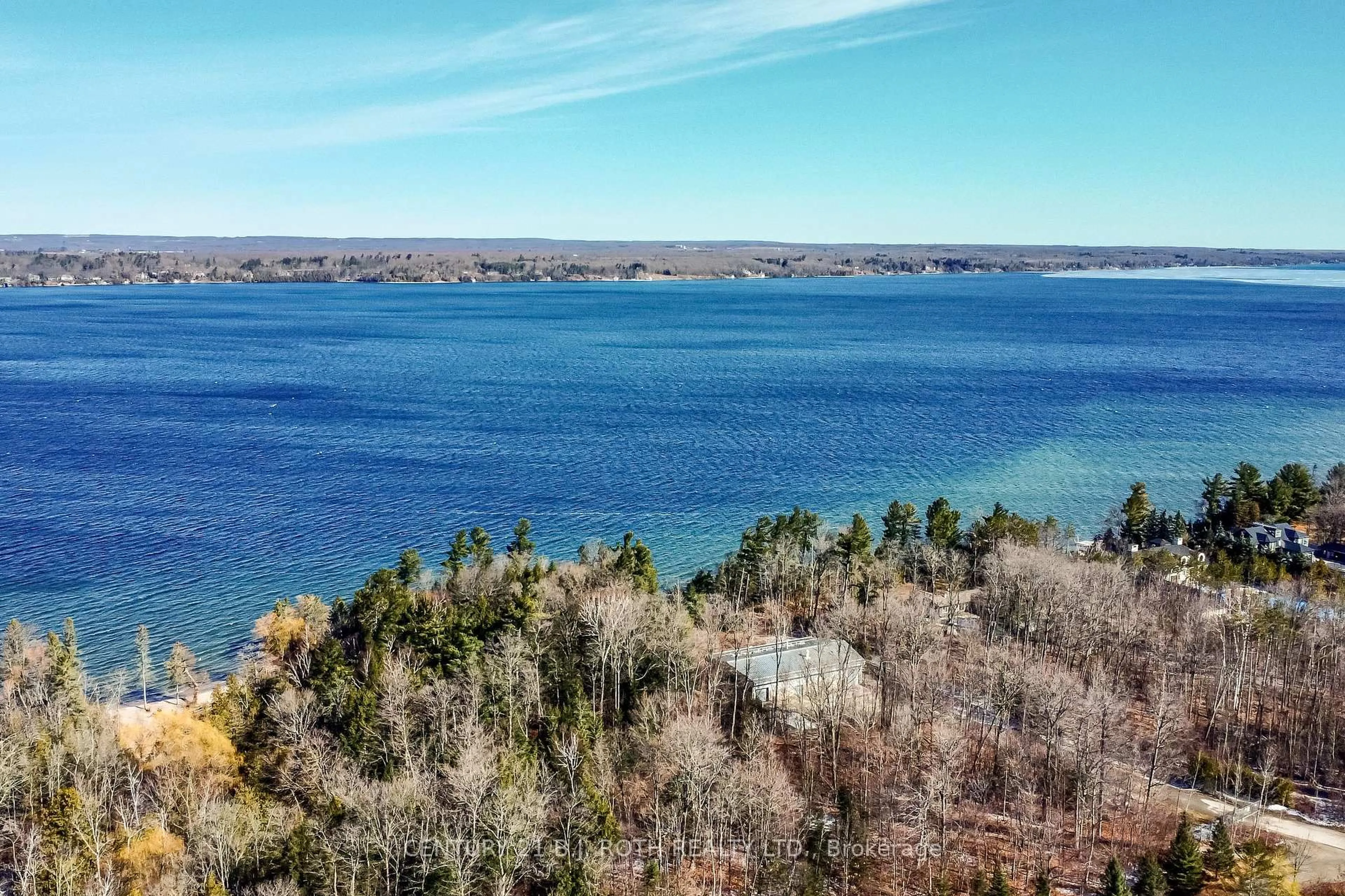 A pic from outside/outdoor area/front of a property/back of a property/a pic from drone, water/lake/river/ocean view for 38 Camelot Sq, Barrie Ontario L4M 0C3