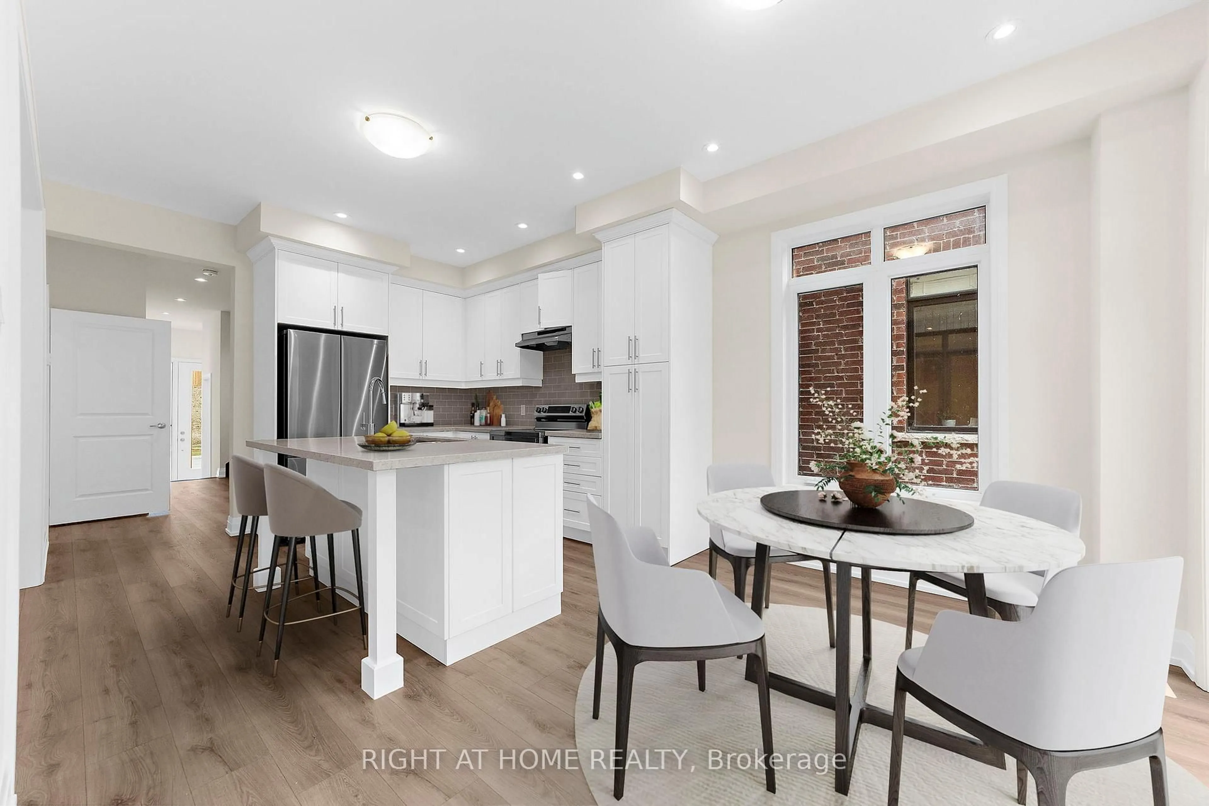 Open concept kitchen, unknown for 33 Calypso Ave, Springwater Ontario L9X 2E3