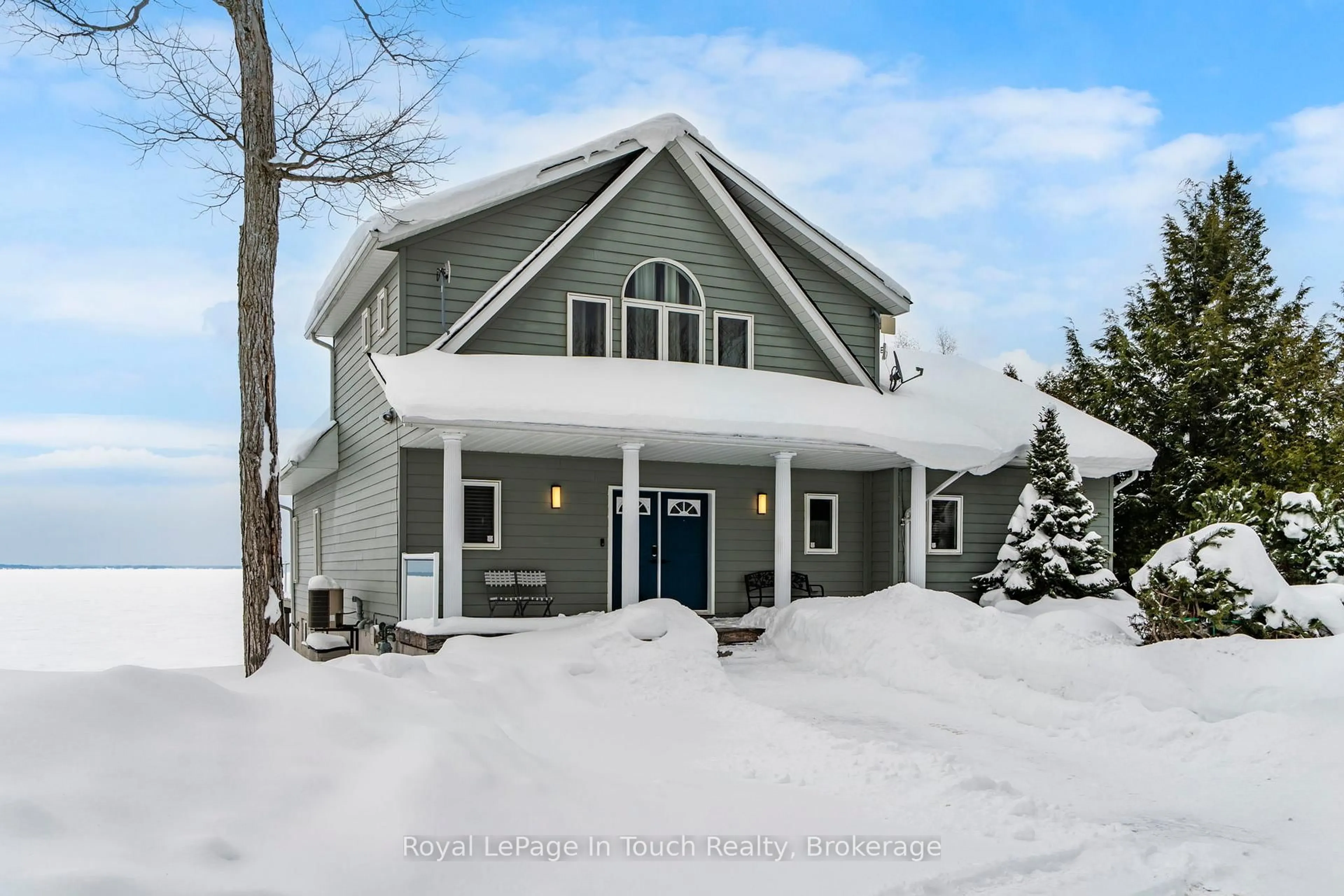 Home with vinyl exterior material, street for 201 Sawlog Point Rd, Tiny Ontario L9M 0B1