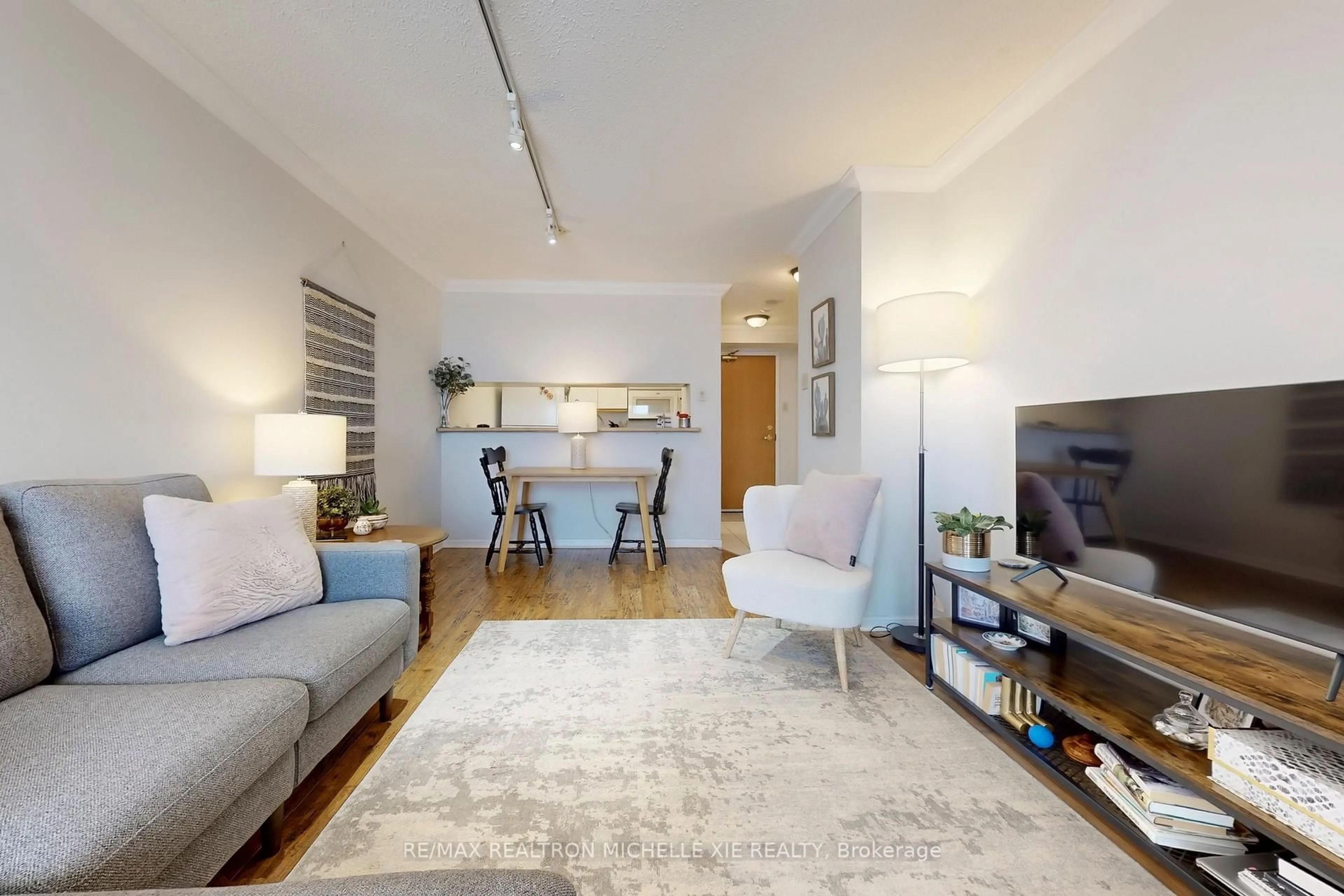 Living room with furniture, unknown for 75 Ellen St #1012, Barrie Ontario L4N 7R6