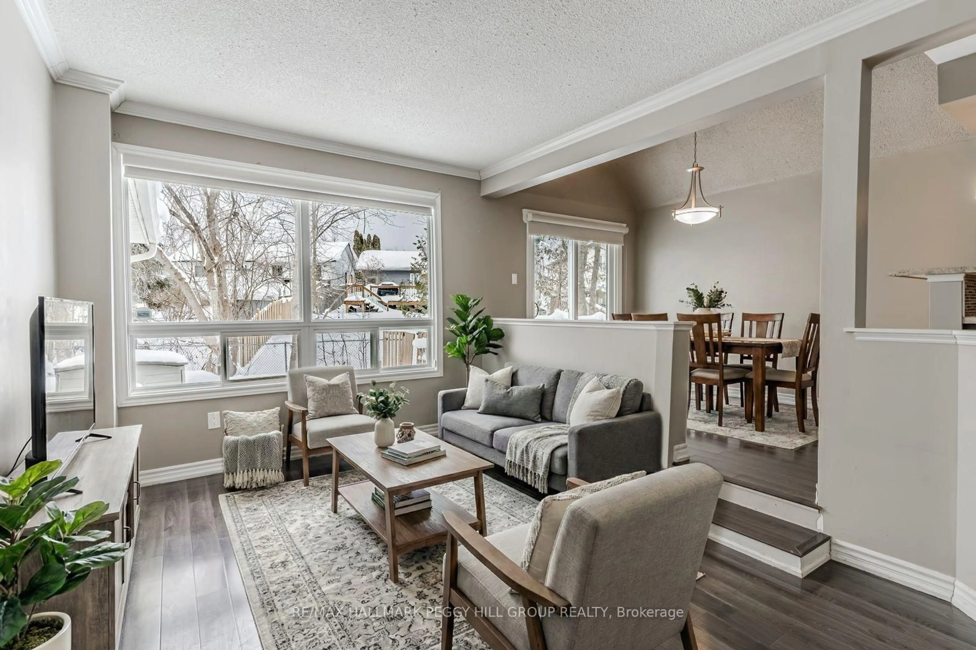 Living room with furniture, wood/laminate floor for 12 Lankin Blvd #20, Orillia Ontario L3V 6T2