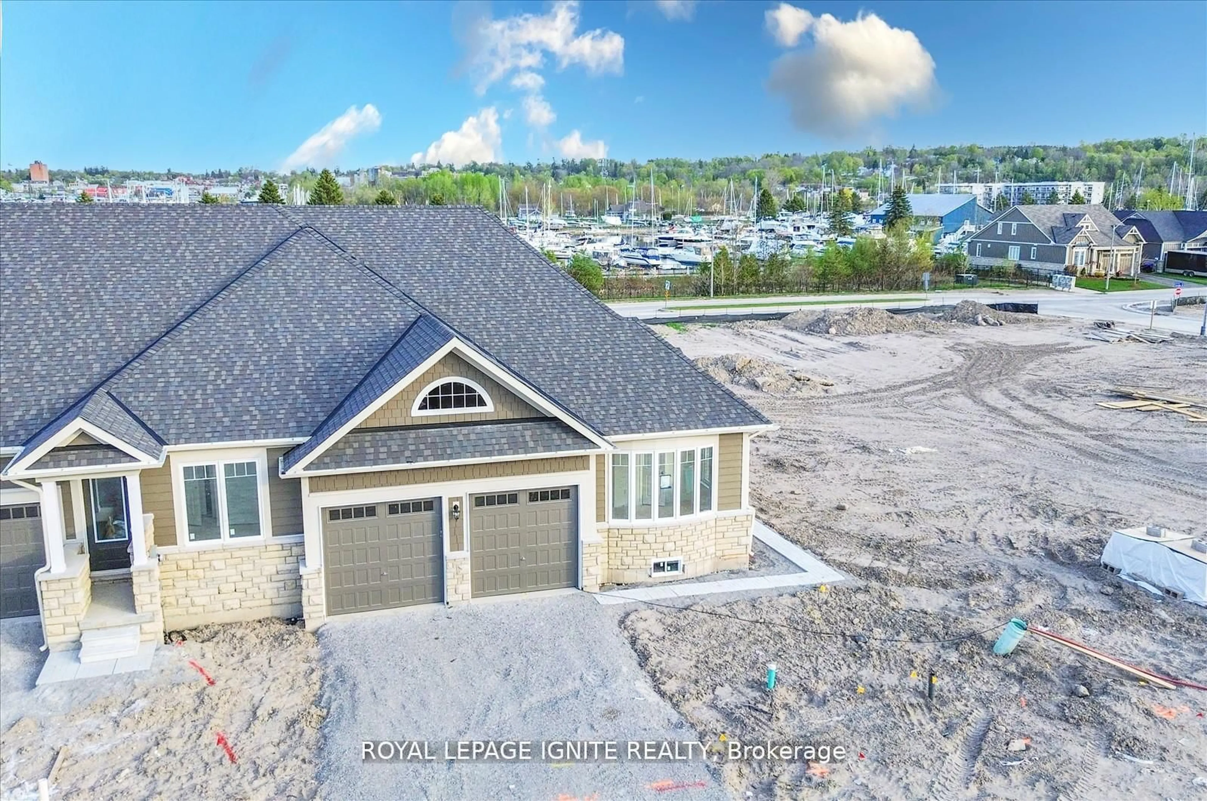 A pic from outside/outdoor area/front of a property/back of a property/a pic from drone, water/lake/river/ocean view for 553 Hudson Cres, Midland Ontario L4R 0J1