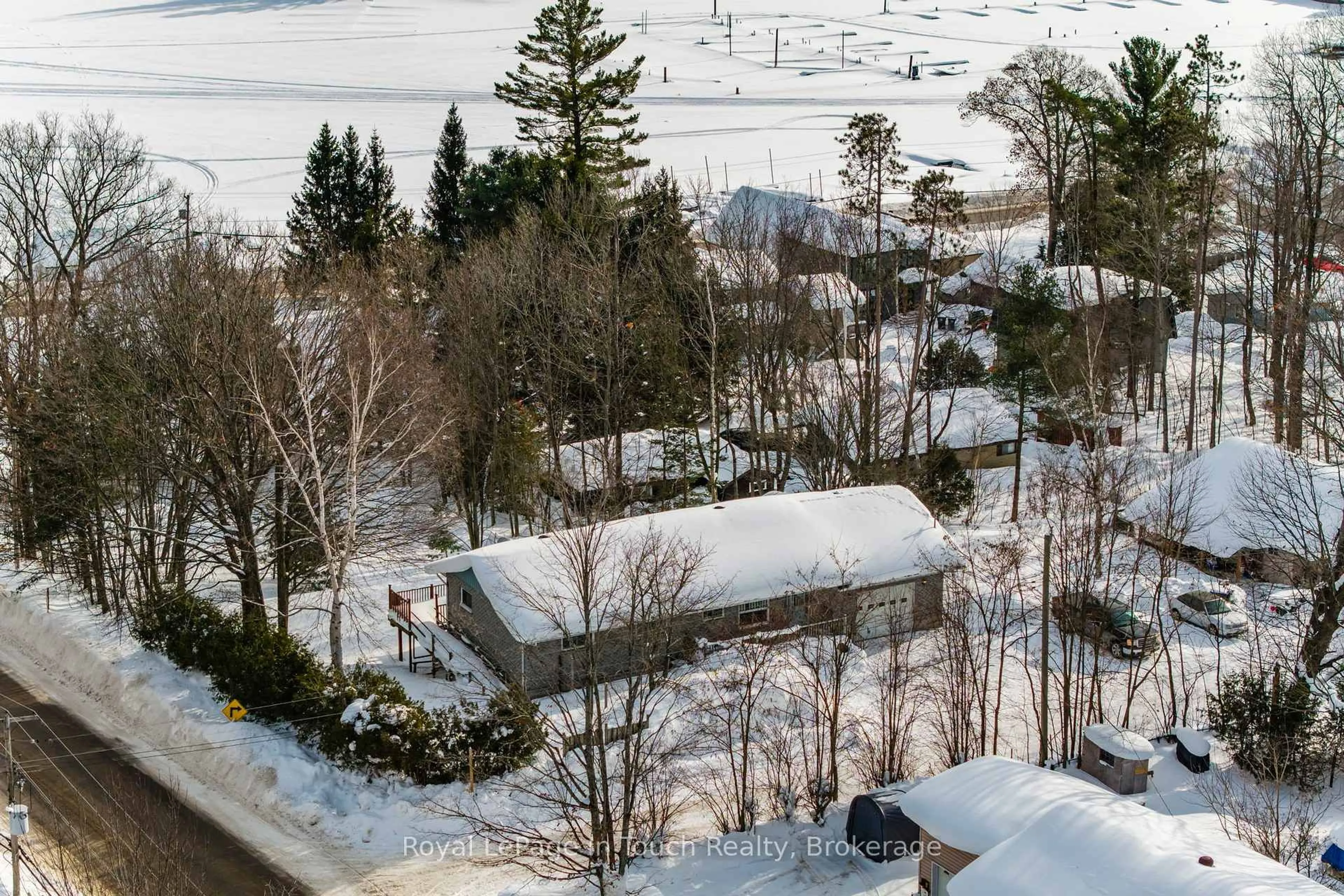 A pic from outside/outdoor area/front of a property/back of a property/a pic from drone, water/lake/river/ocean view for 1 Logmoss Rd, Tiny Ontario L9M 0C2