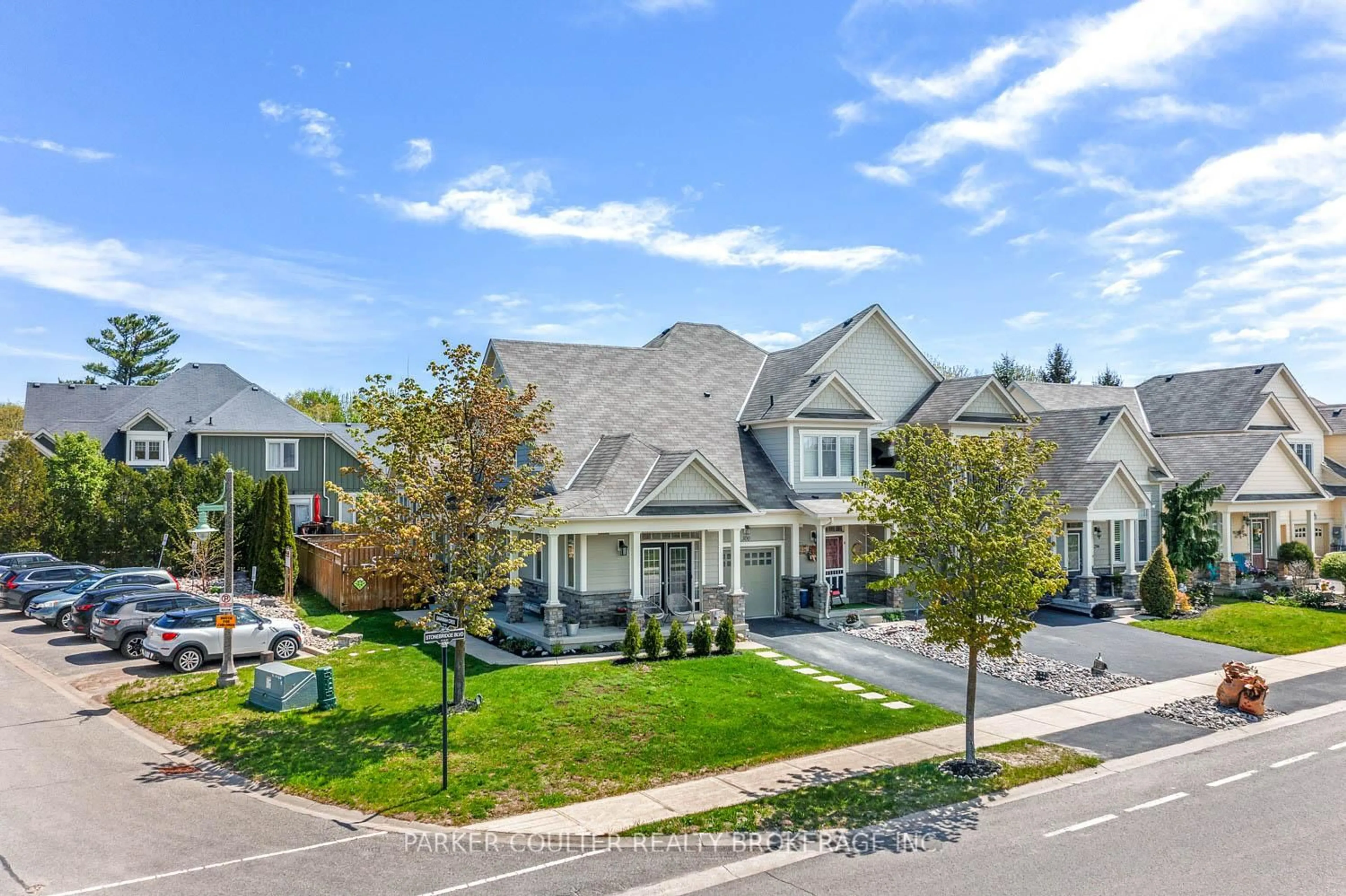 A pic from outside/outdoor area/front of a property/back of a property/a pic from drone, street for 300 Stonebridge Blvd, Wasaga Beach Ontario L9Z 0E7
