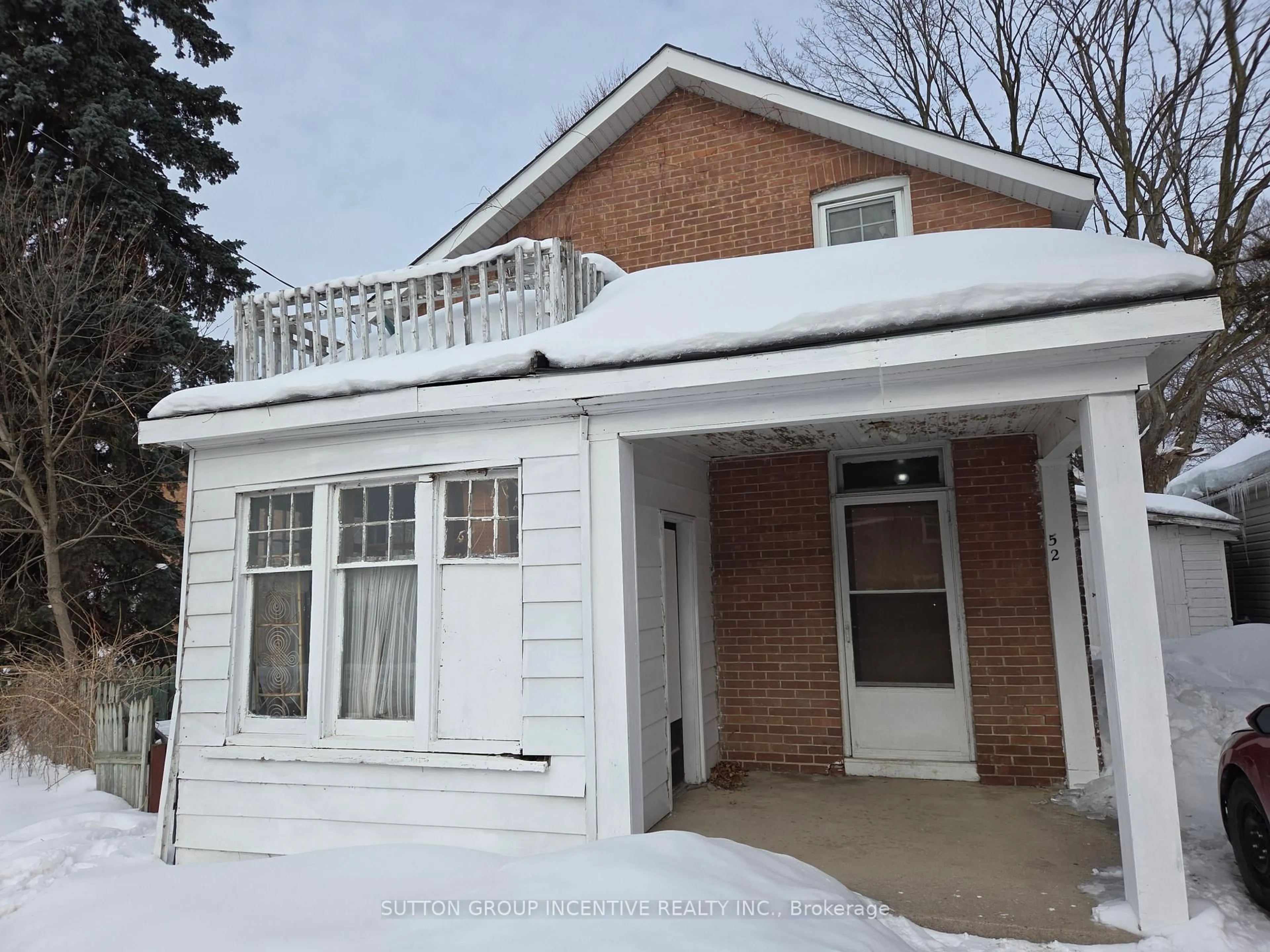 Home with brick exterior material, street for 52 McDonald St, Barrie Ontario L4M 1P3
