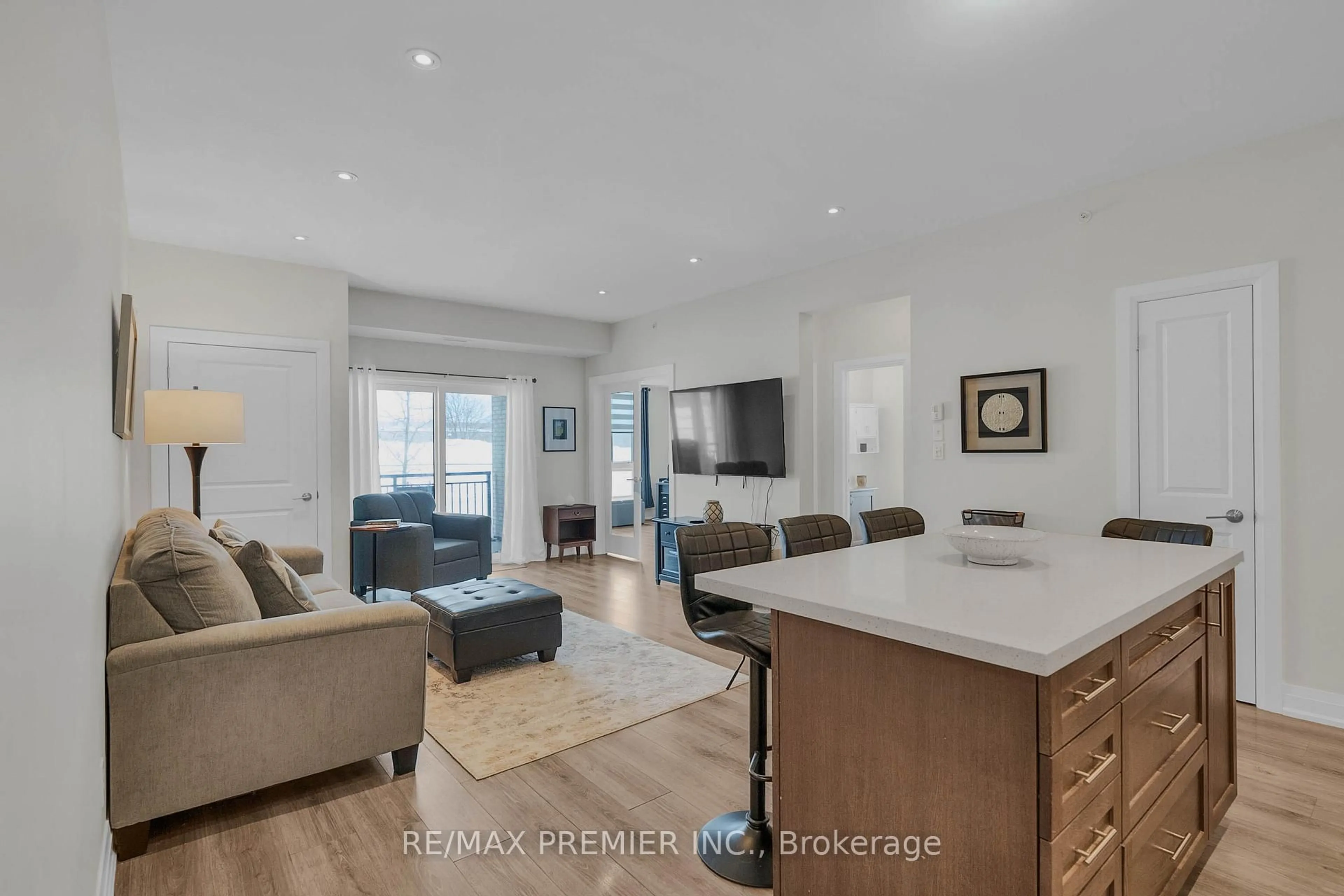 Living room with furniture, unknown for 299 Cundles Rd #110, Barrie Ontario L4M 5J7