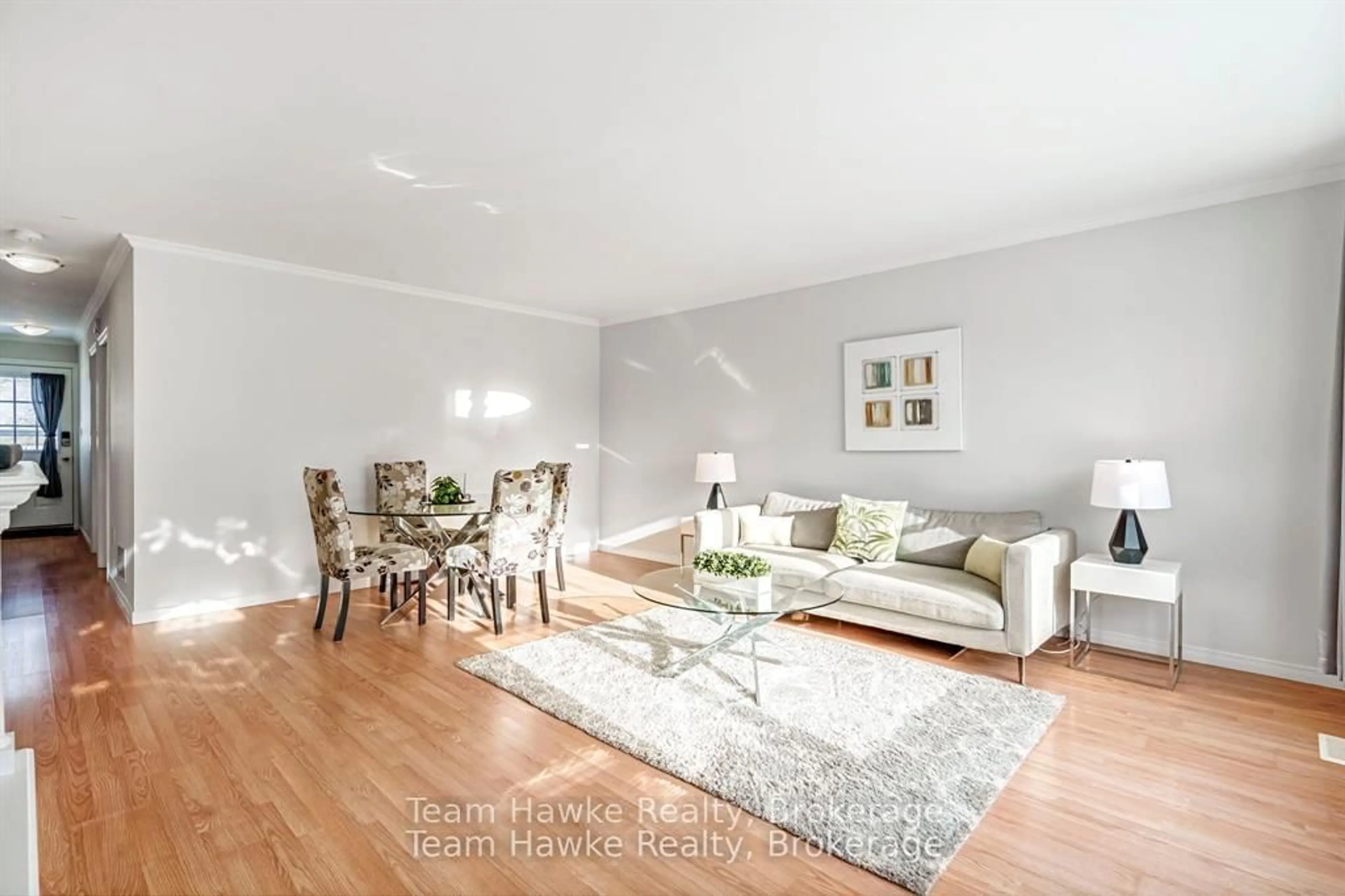 Living room with furniture, wood/laminate floor for 264 Kingfisher Ave, Tay Ontario L0K 1R0