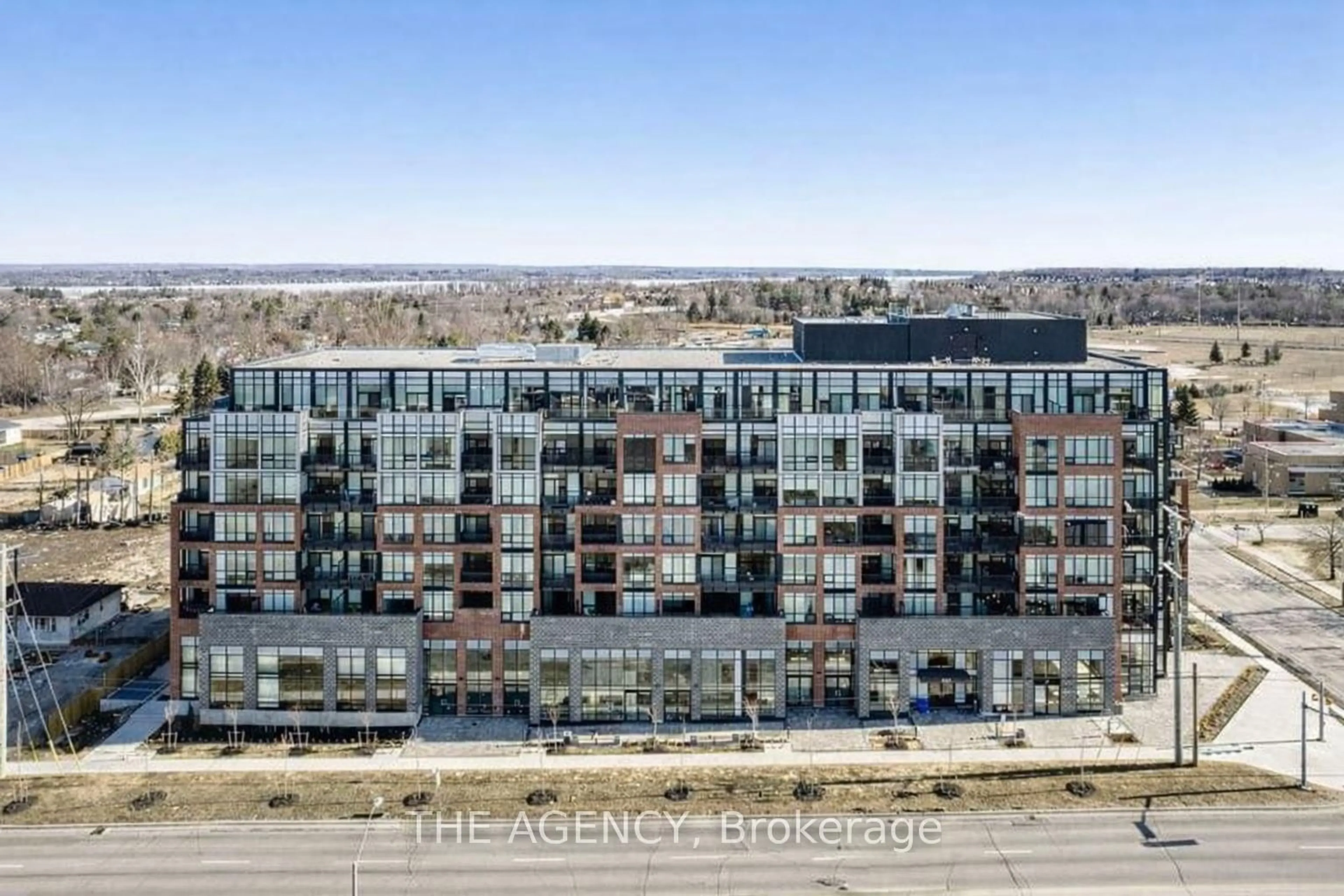 A pic from outside/outdoor area/front of a property/back of a property/a pic from drone, city buildings view from balcony for 681 Yonge St #327, Barrie Ontario L4N 4E8