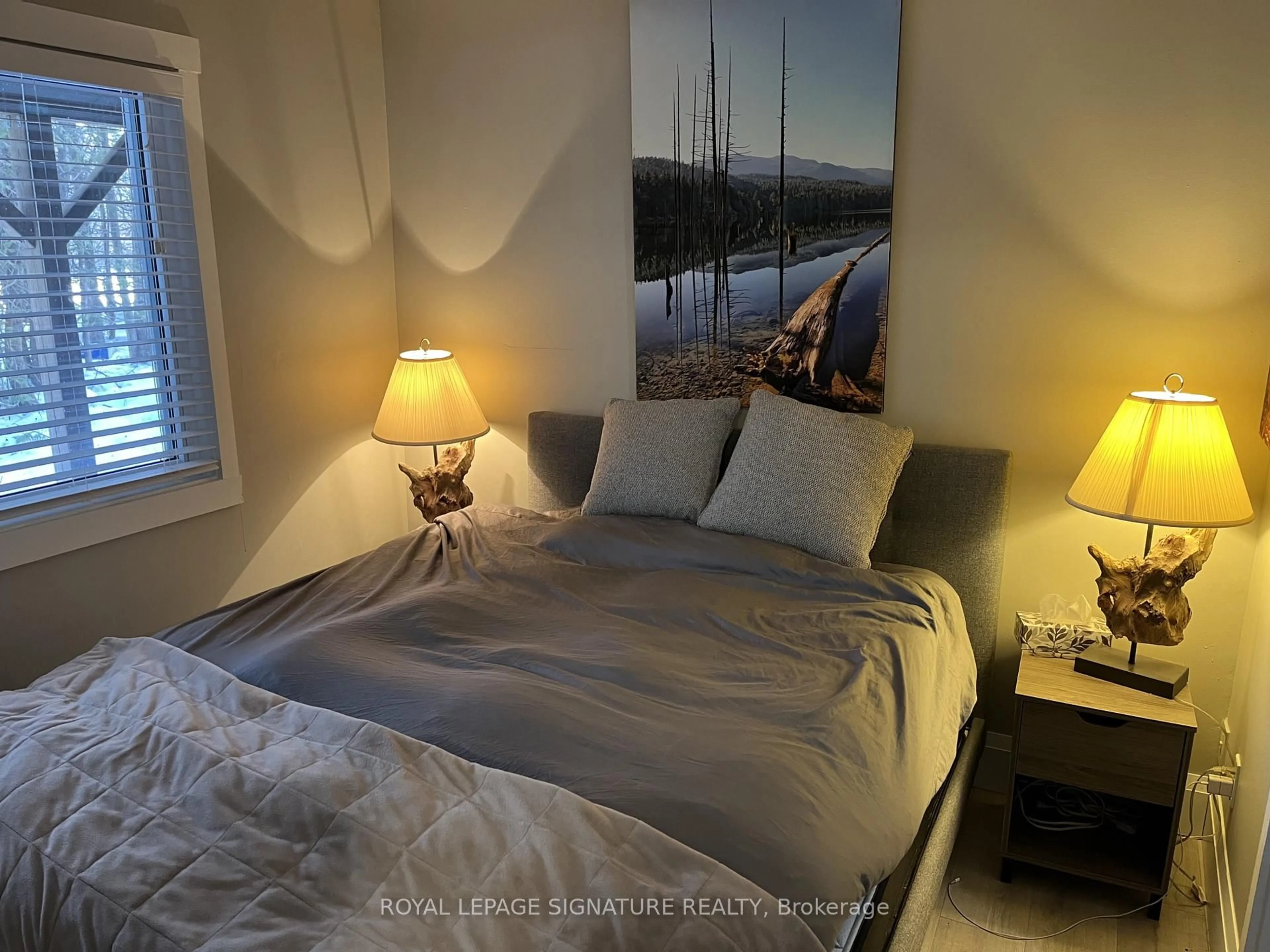 Bedroom with bed, wood/laminate floor for 19 Dawson Dr #48, Collingwood Ontario L9Y 5B4