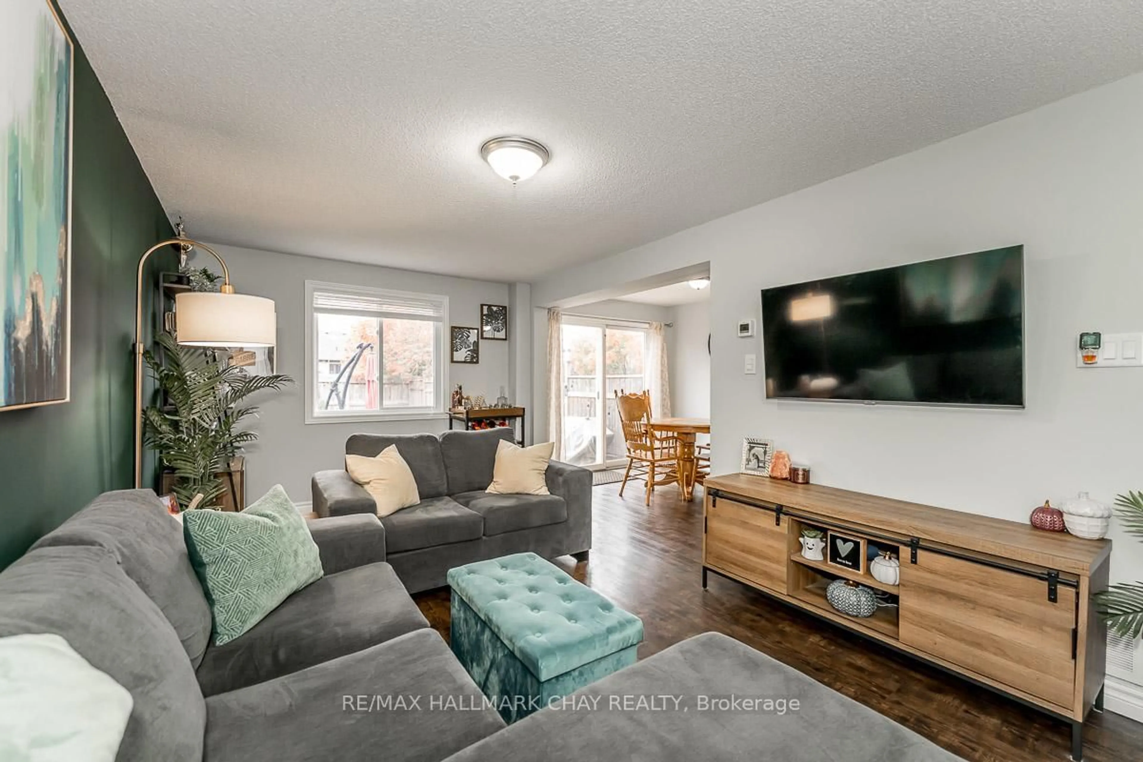 Living room with furniture, unknown for 50 Raymond Cres, Barrie Ontario L4N 0X6