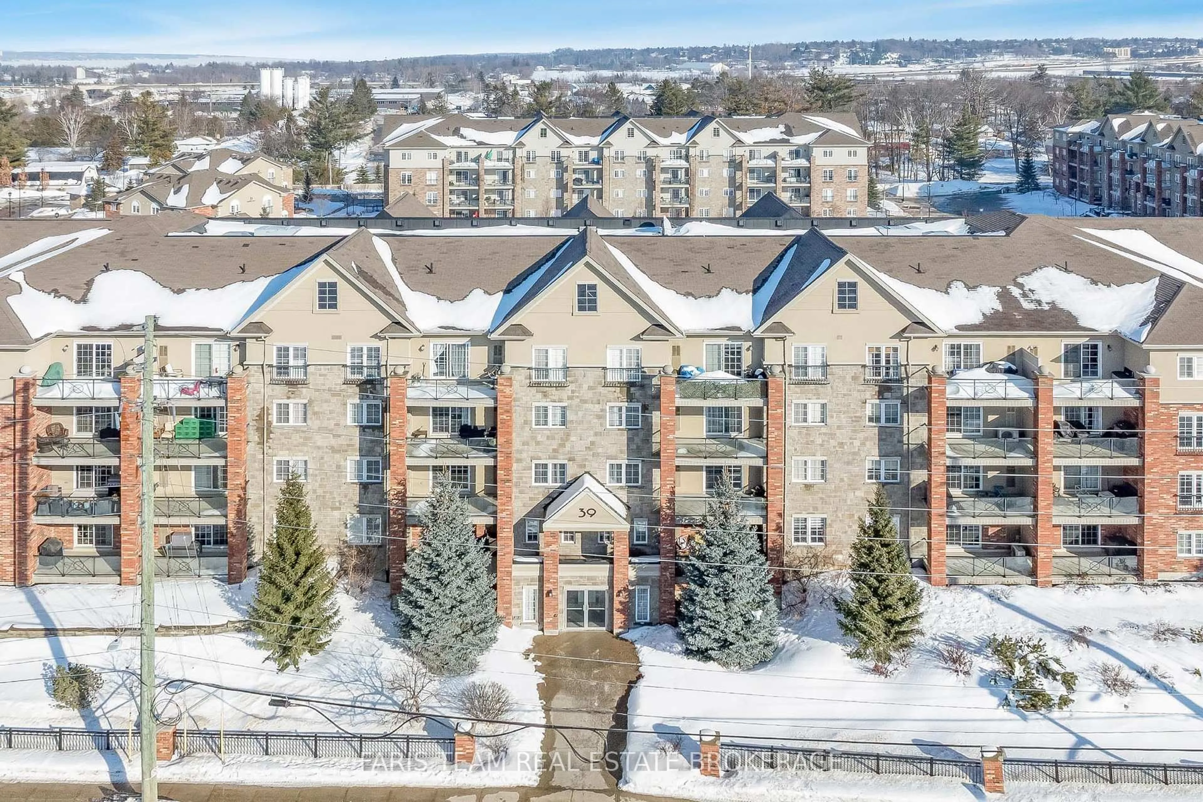 A pic from outside/outdoor area/front of a property/back of a property/a pic from drone, city buildings view from balcony for 39 Ferndale Dr #202, Barrie Ontario L4N 5T5