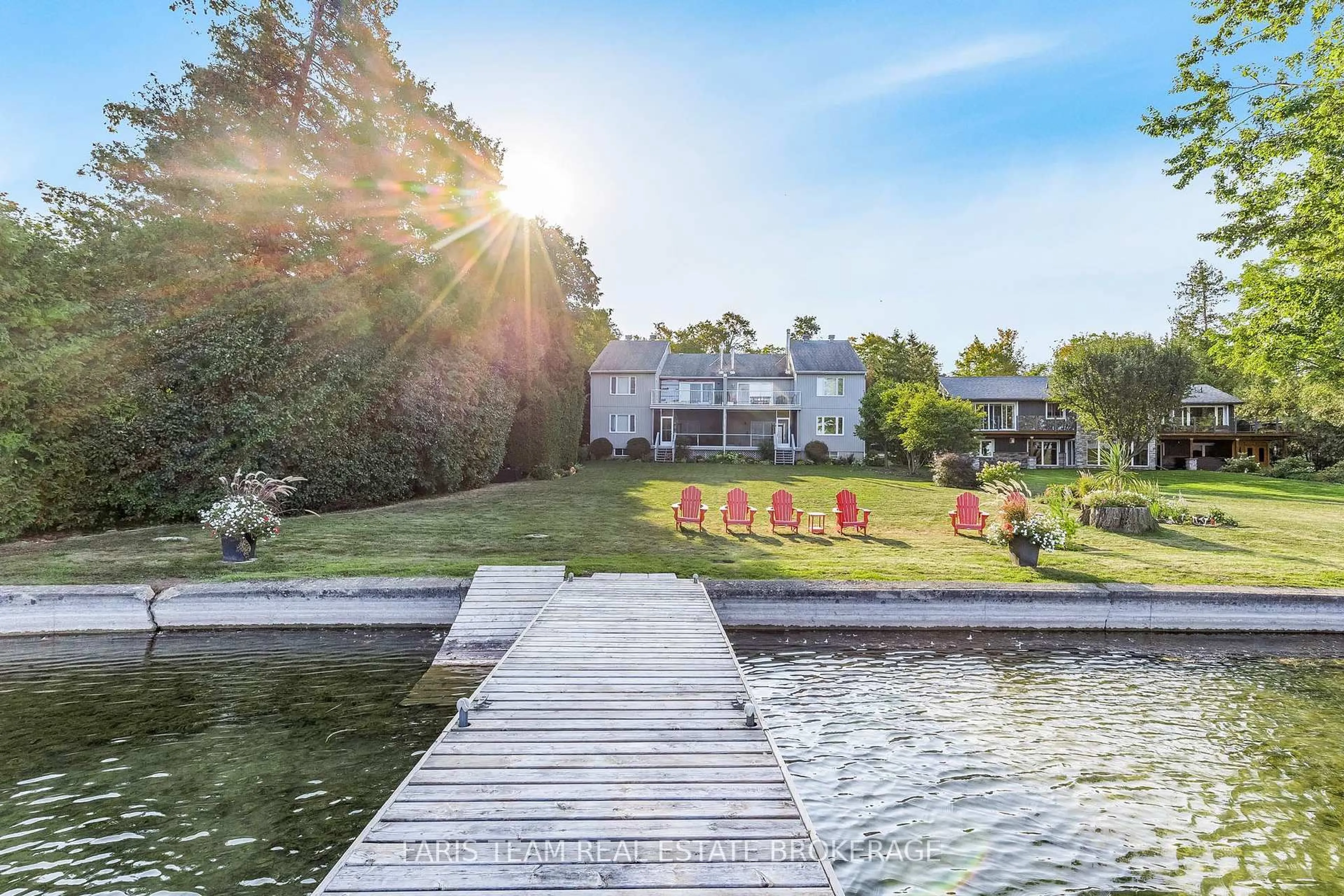 A pic from outside/outdoor area/front of a property/back of a property/a pic from drone, water/lake/river/ocean view for 260 Cedarmere Rd #101, Orillia Ontario L3V 7H1