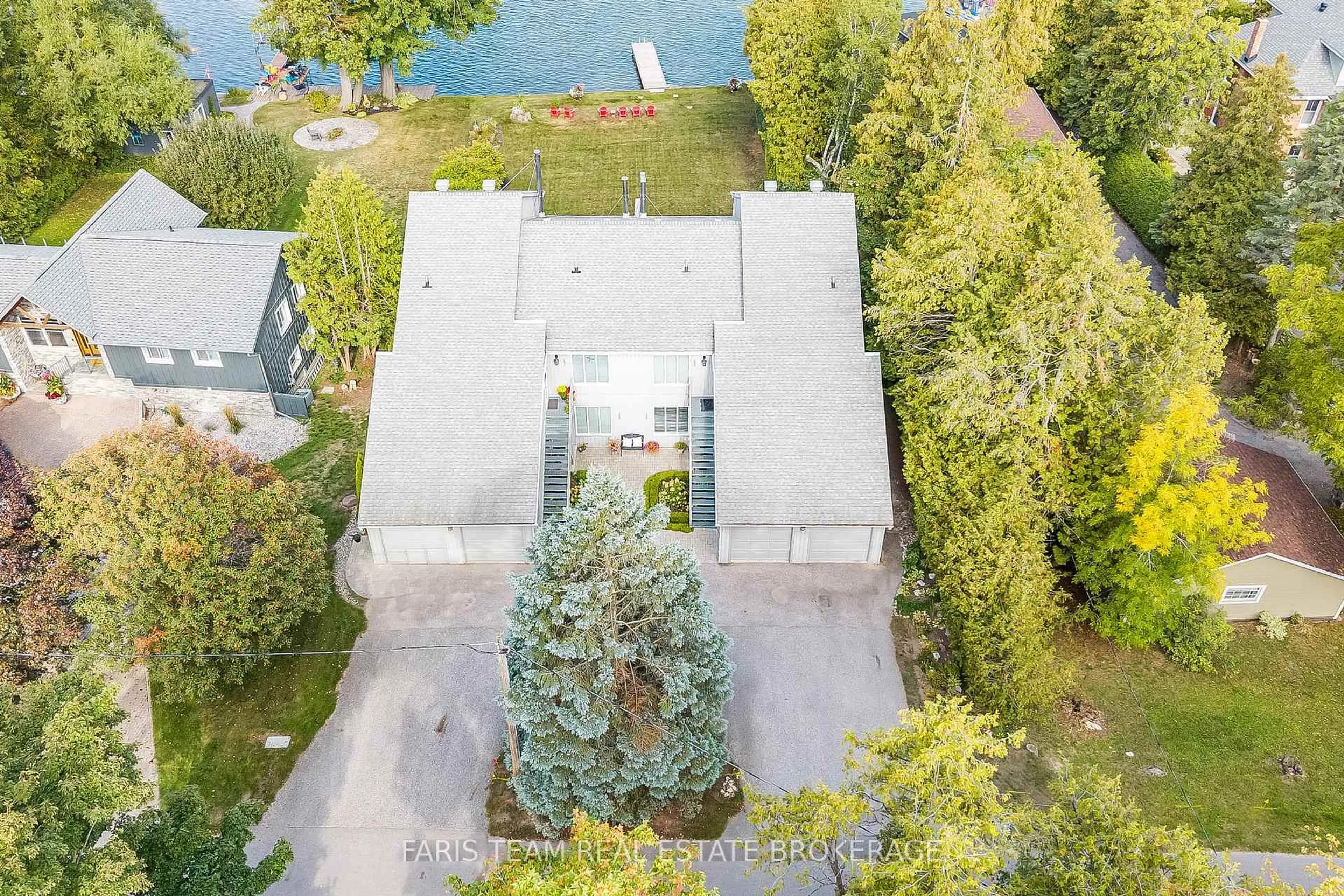 A pic from outside/outdoor area/front of a property/back of a property/a pic from drone, water/lake/river/ocean view for 260 Cedarmere Rd #101, Orillia Ontario L3V 7H1