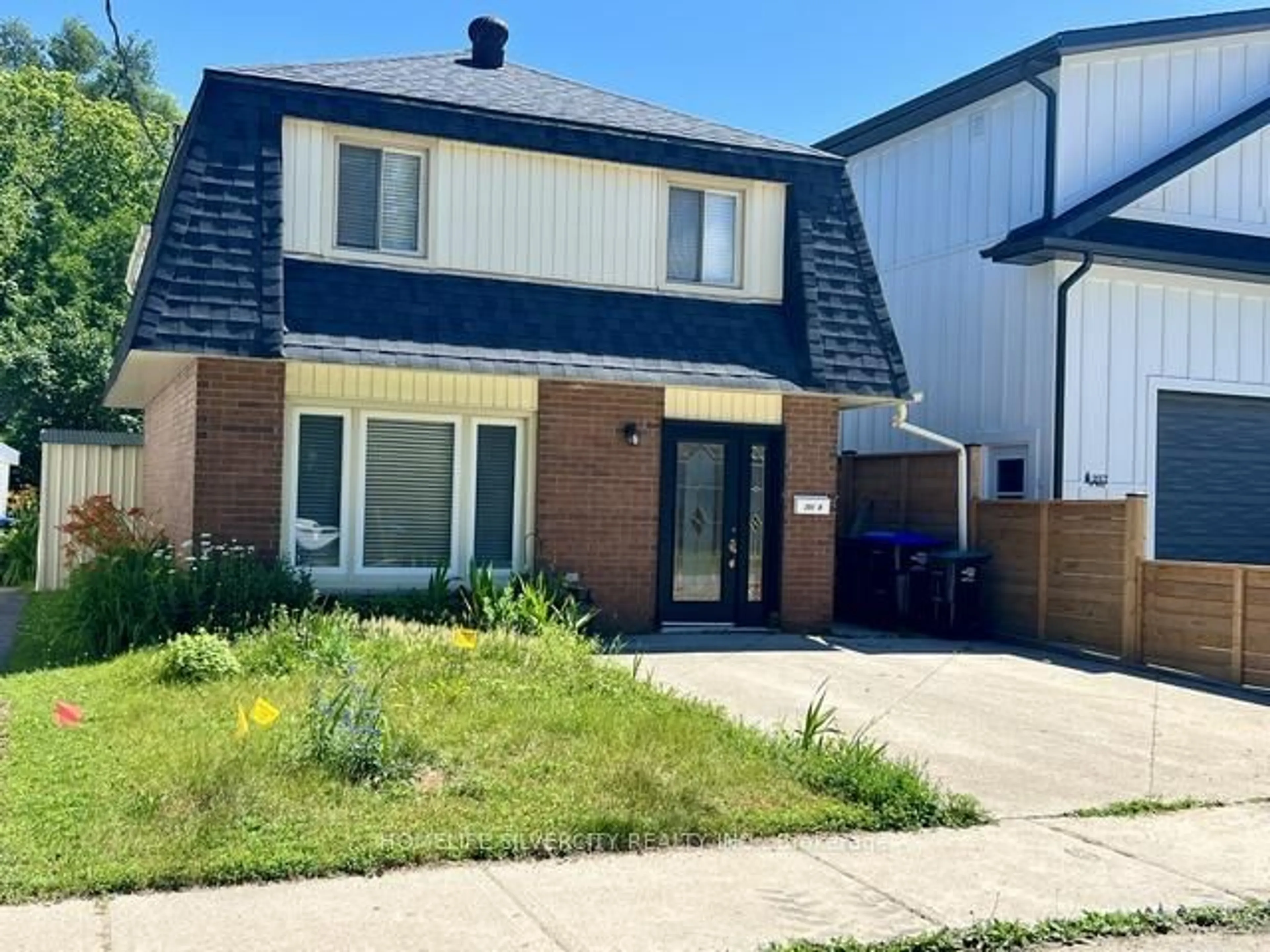 Home with brick exterior material, street for 251 St Paul St, Collingwood Ontario L9Y 3P5