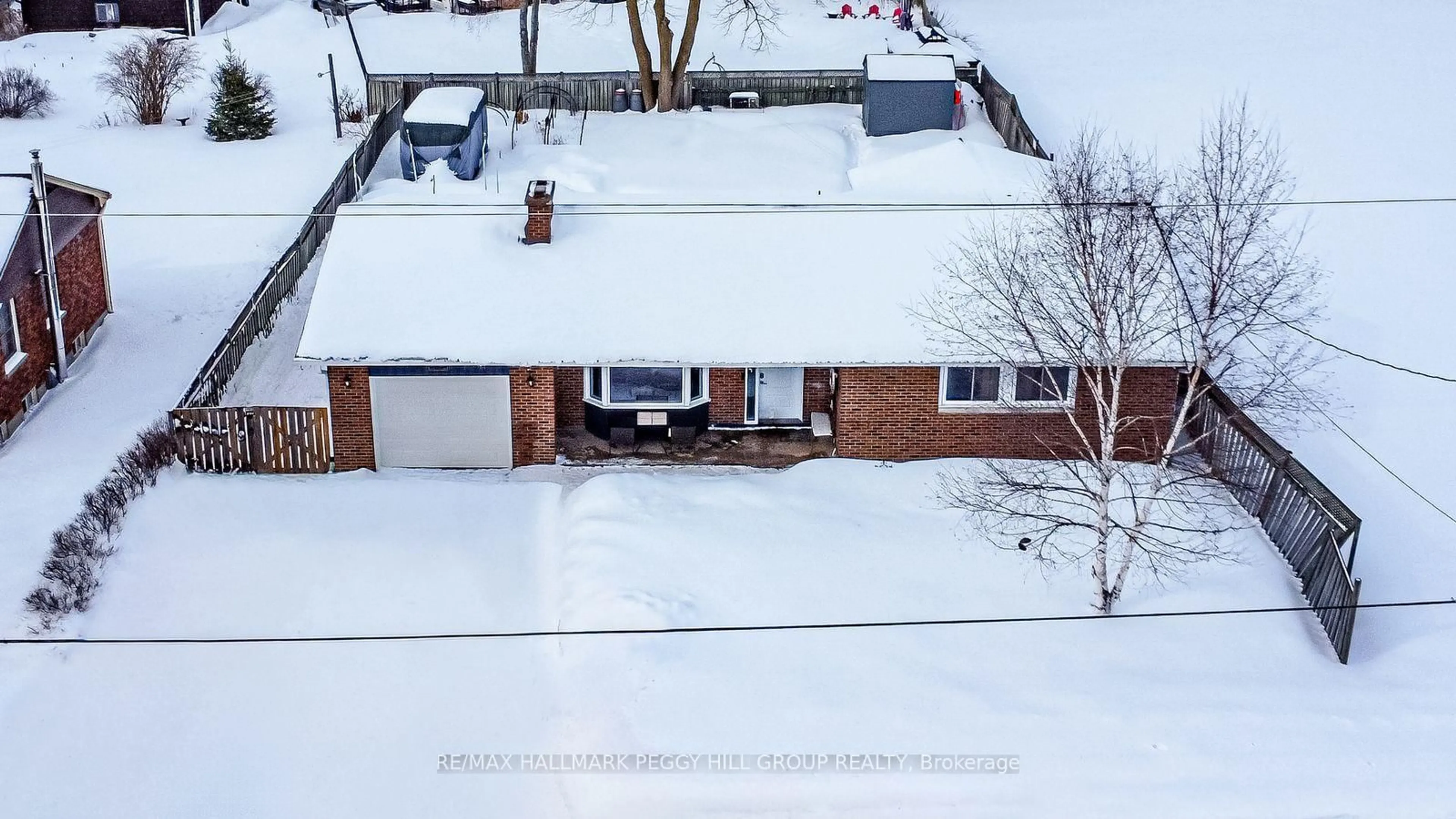 A pic from outside/outdoor area/front of a property/back of a property/a pic from drone, street for 90 Queen St, Springwater Ontario L0L 1P0