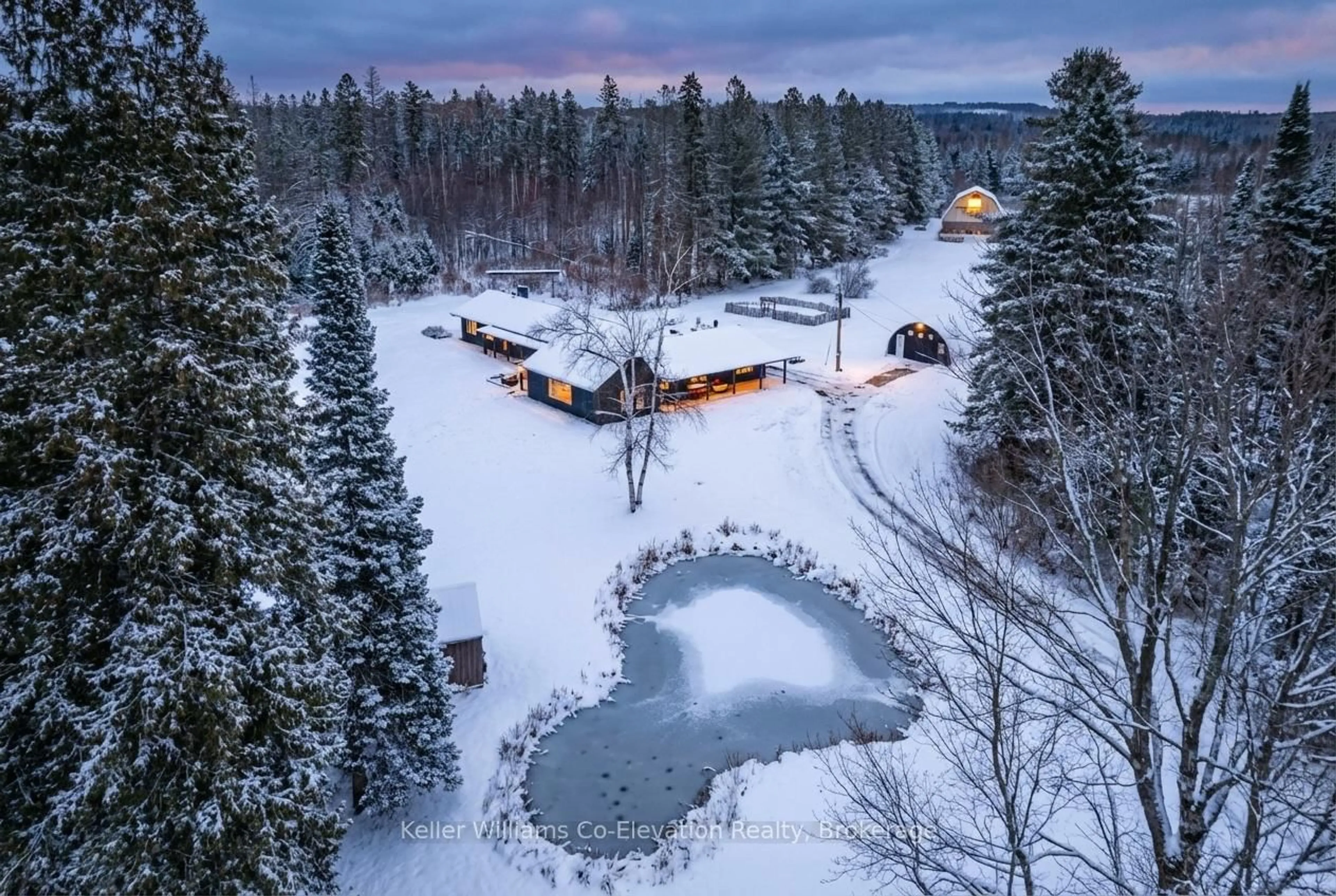 A pic from outside/outdoor area/front of a property/back of a property/a pic from drone, water/lake/river/ocean view for 1076 Beaver Lane, Springwater Ontario L9X 0M1