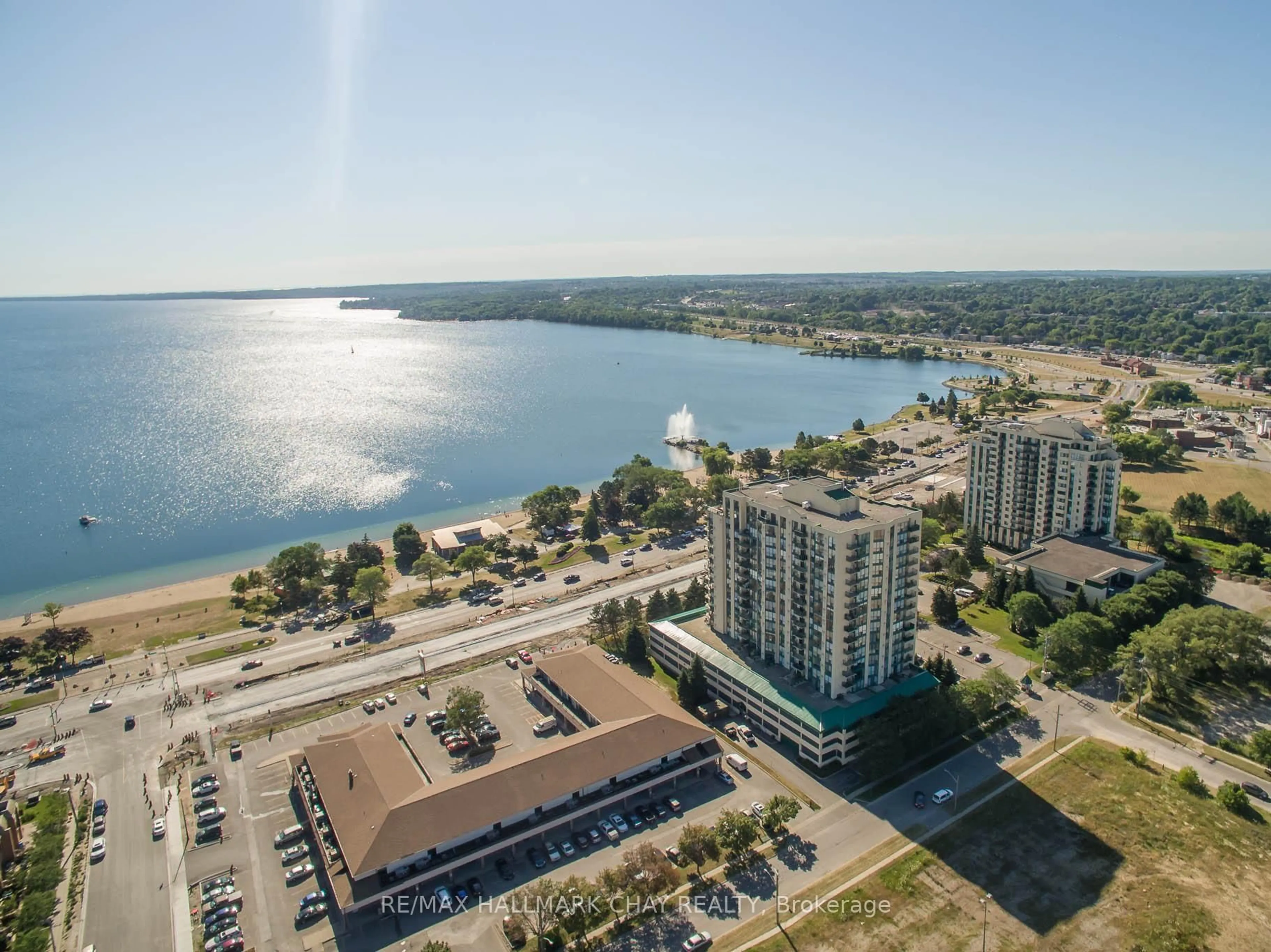 A pic from outside/outdoor area/front of a property/back of a property/a pic from drone, water/lake/river/ocean view for 65 Ellen St #502, Barrie Ontario L4N 3A5