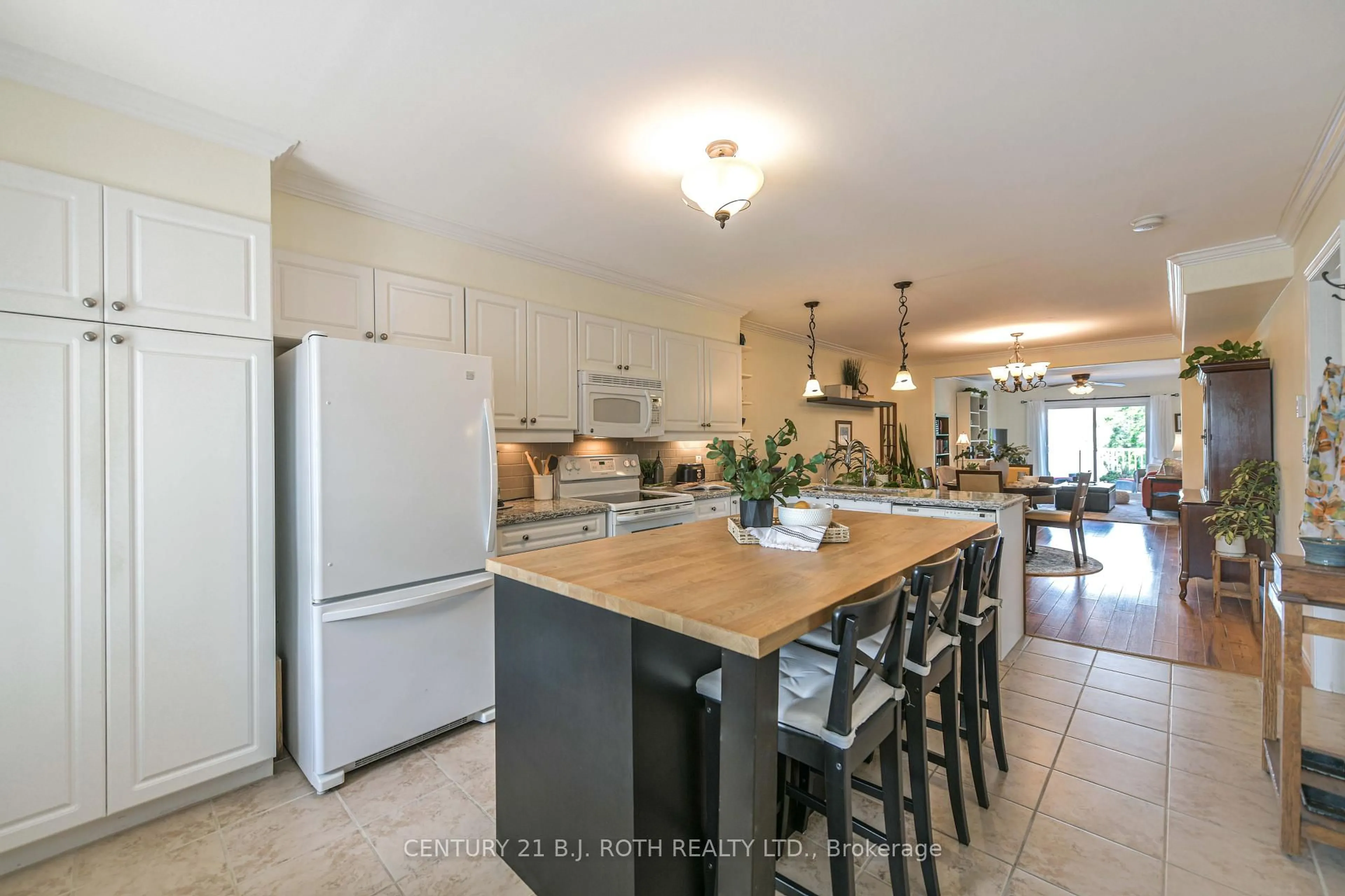 Open concept kitchen, ceramic/tile floor for 43 Creighton St #204, Ramara Ontario L3V 1B1