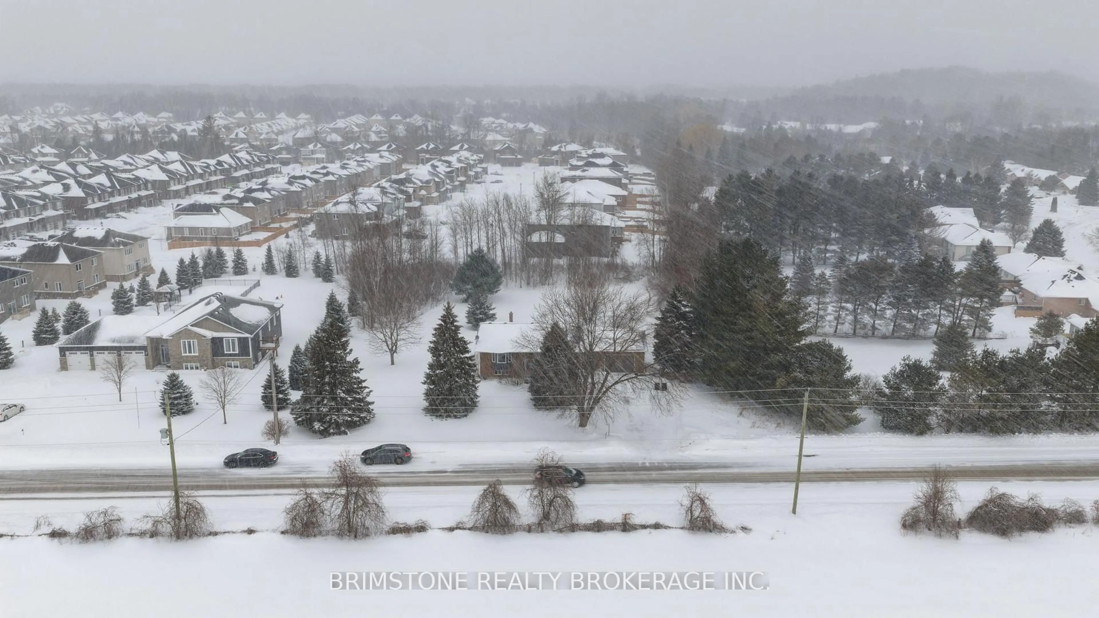 A pic from outside/outdoor area/front of a property/back of a property/a pic from drone, mountain view for 220 Morgan Rd, Wasaga Beach Ontario L9Z 1N4