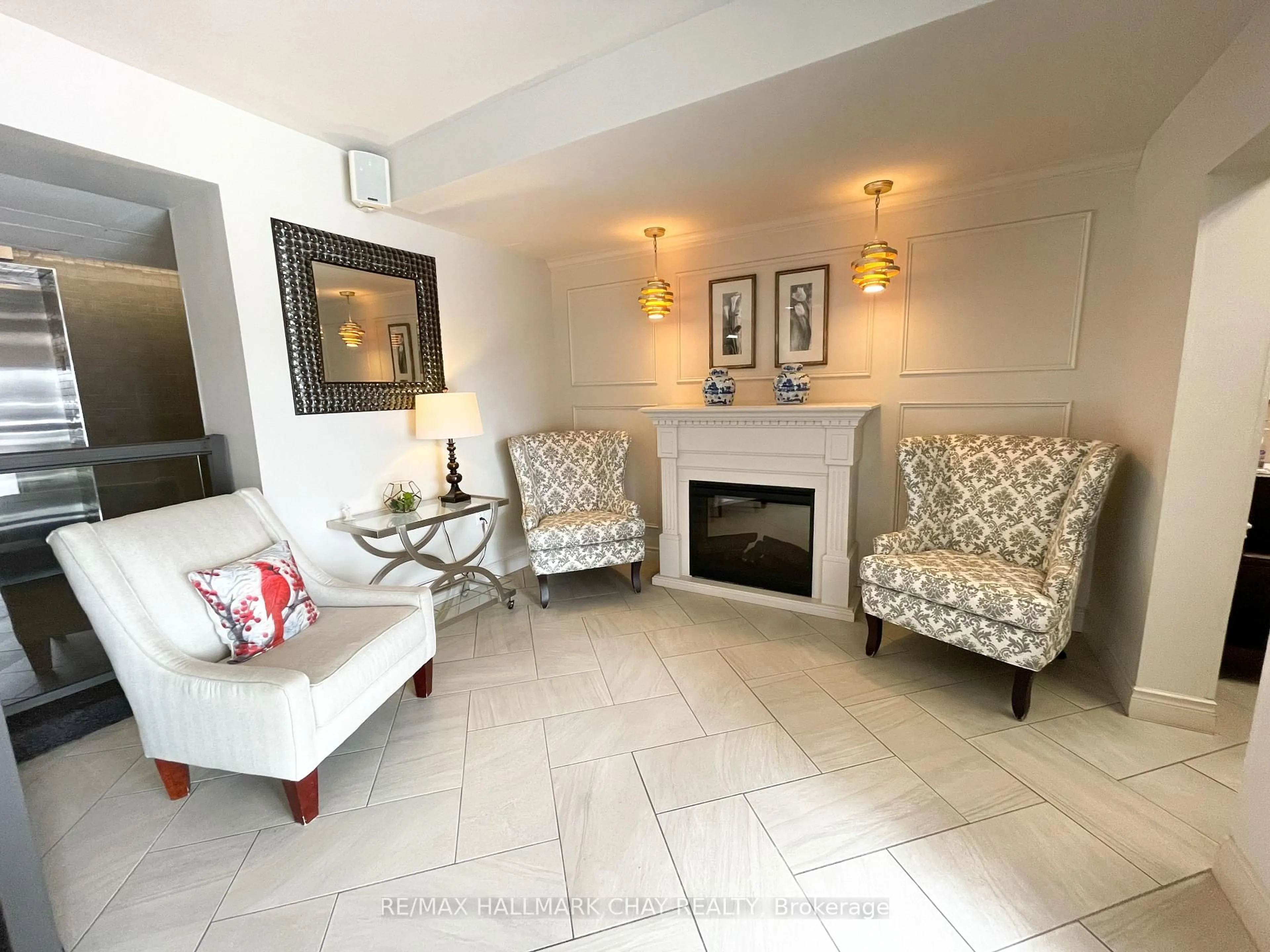 Living room with furniture, ceramic/tile floor for 414 Blake St #702, Barrie Ontario L4M 5J7