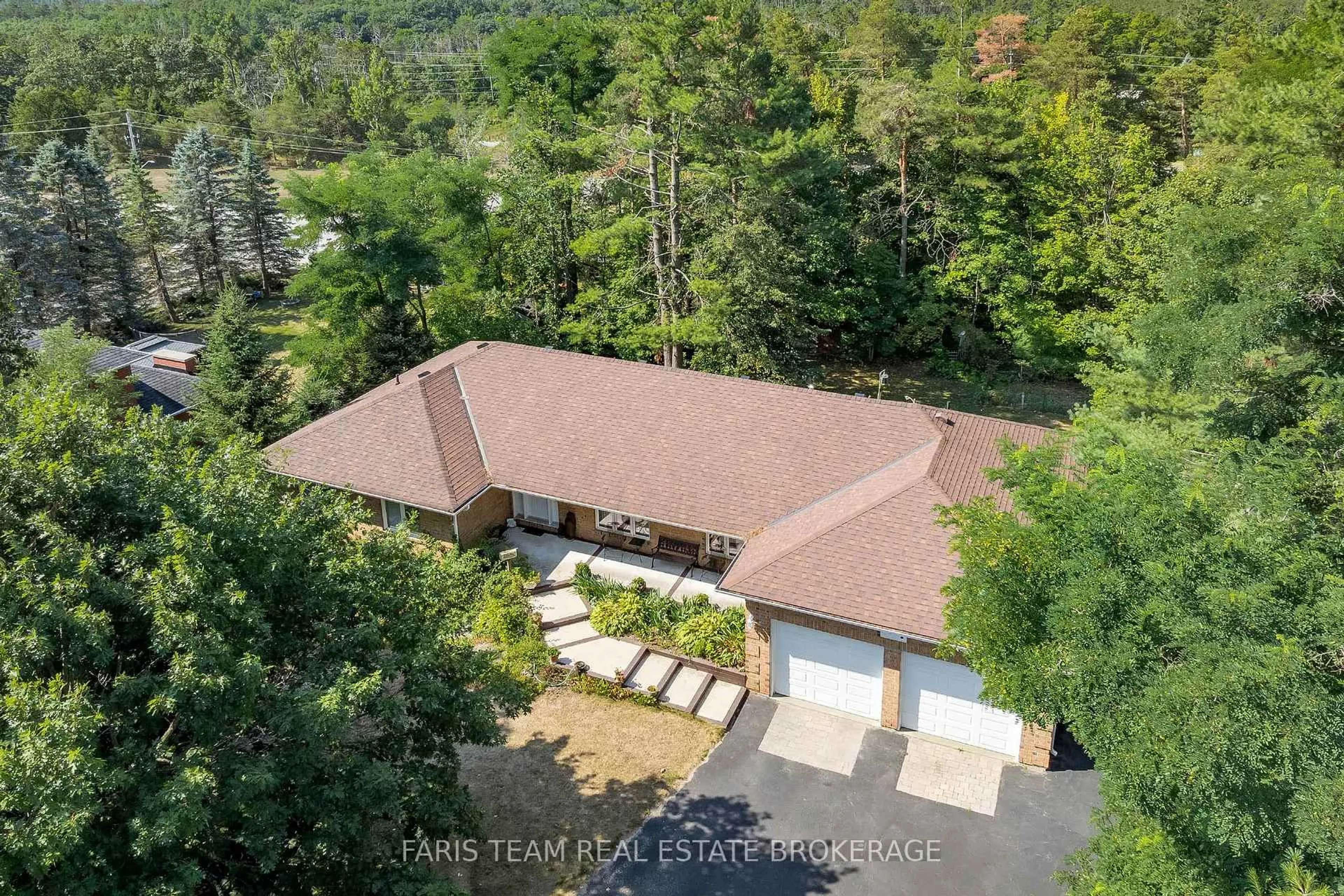 A pic from outside/outdoor area/front of a property/back of a property/a pic from drone, forest/trees view for 21 Forest Hill Dr, Springwater Ontario L9X 0J4