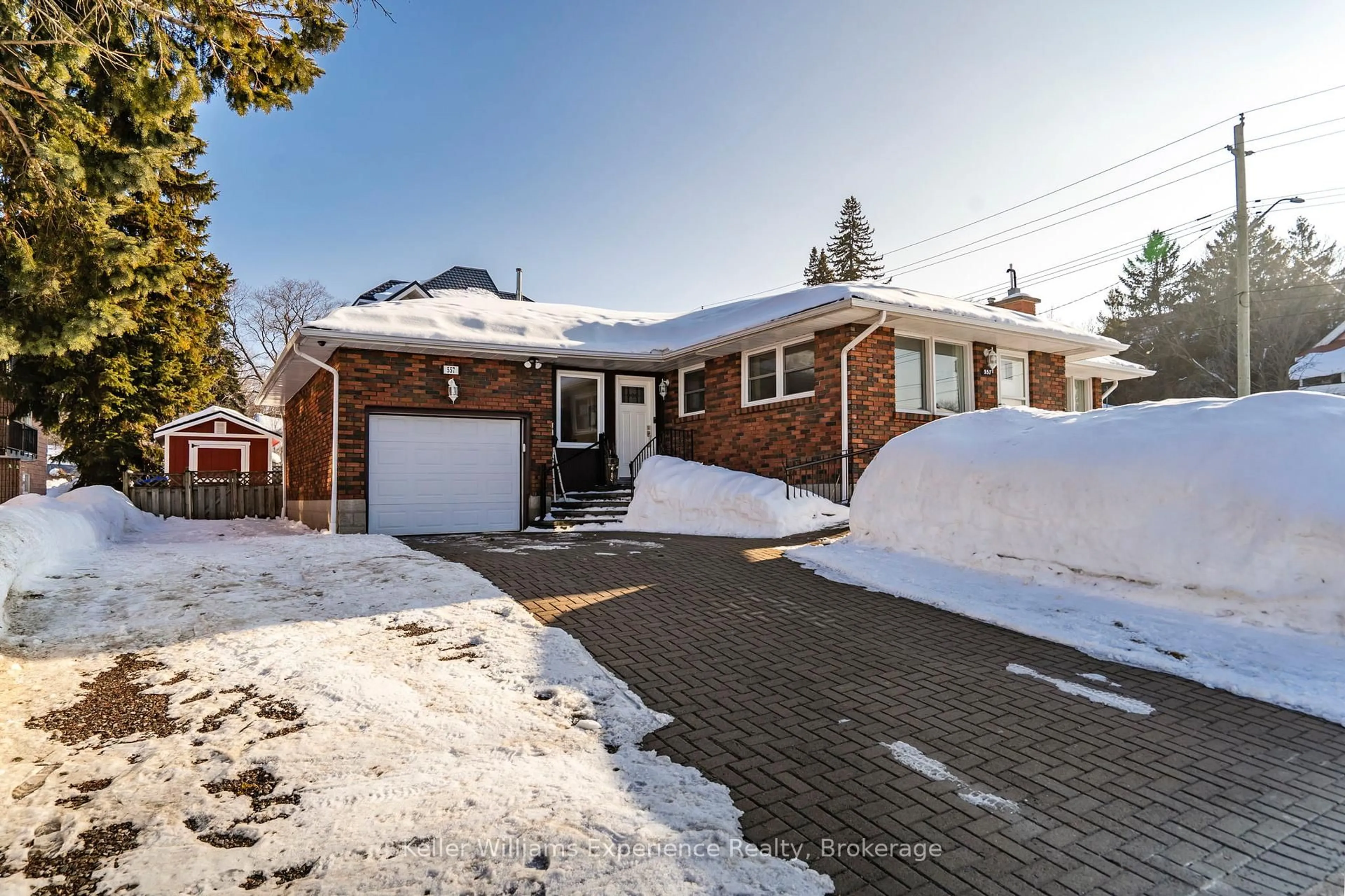 Home with brick exterior material, street for 557 Hugel Ave, Midland Ontario L4R 1W1