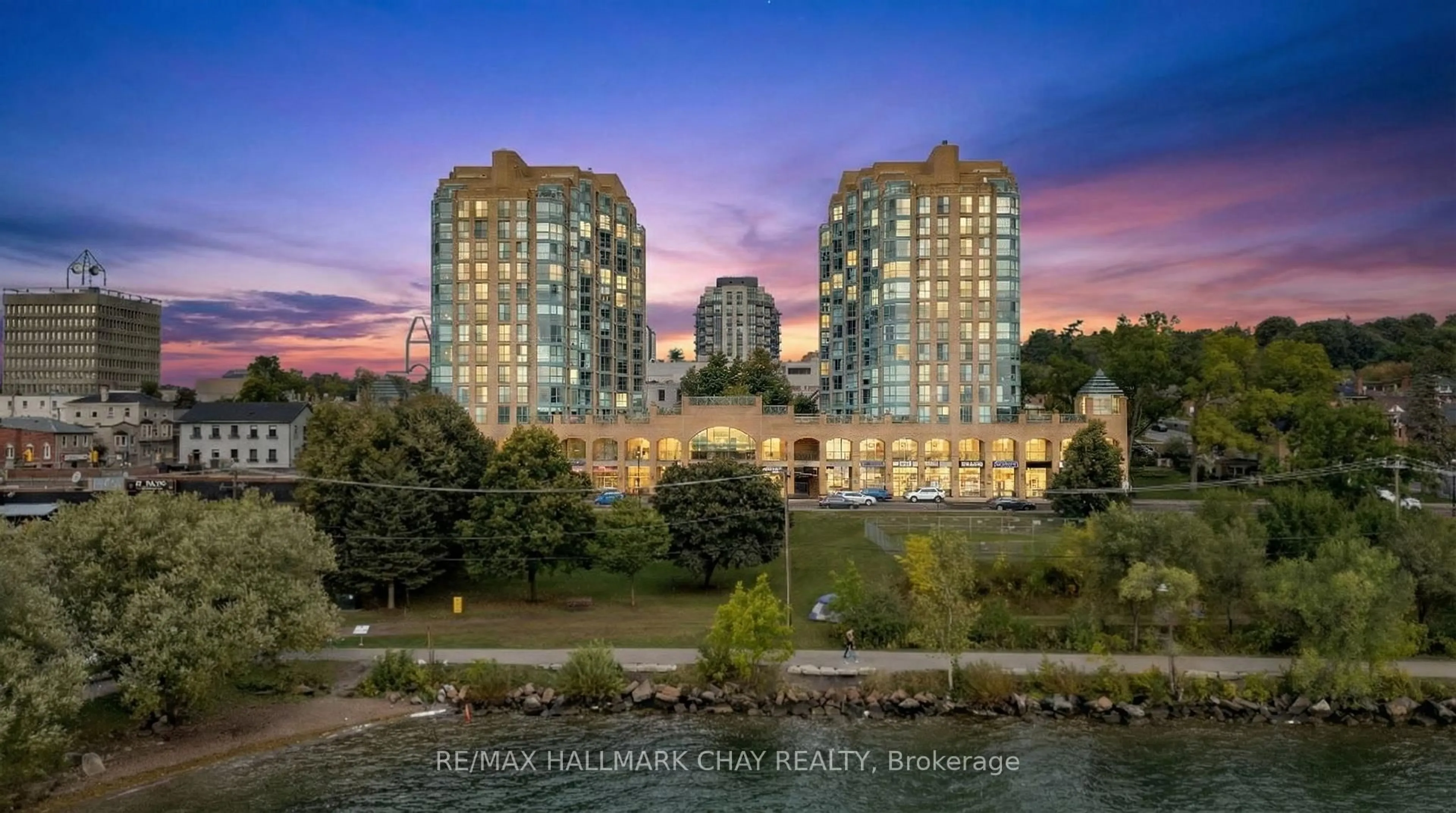 A pic from outside/outdoor area/front of a property/back of a property/a pic from drone, water/lake/river/ocean view for 140 Dunlop St #1003, Barrie Ontario L4M 6H9