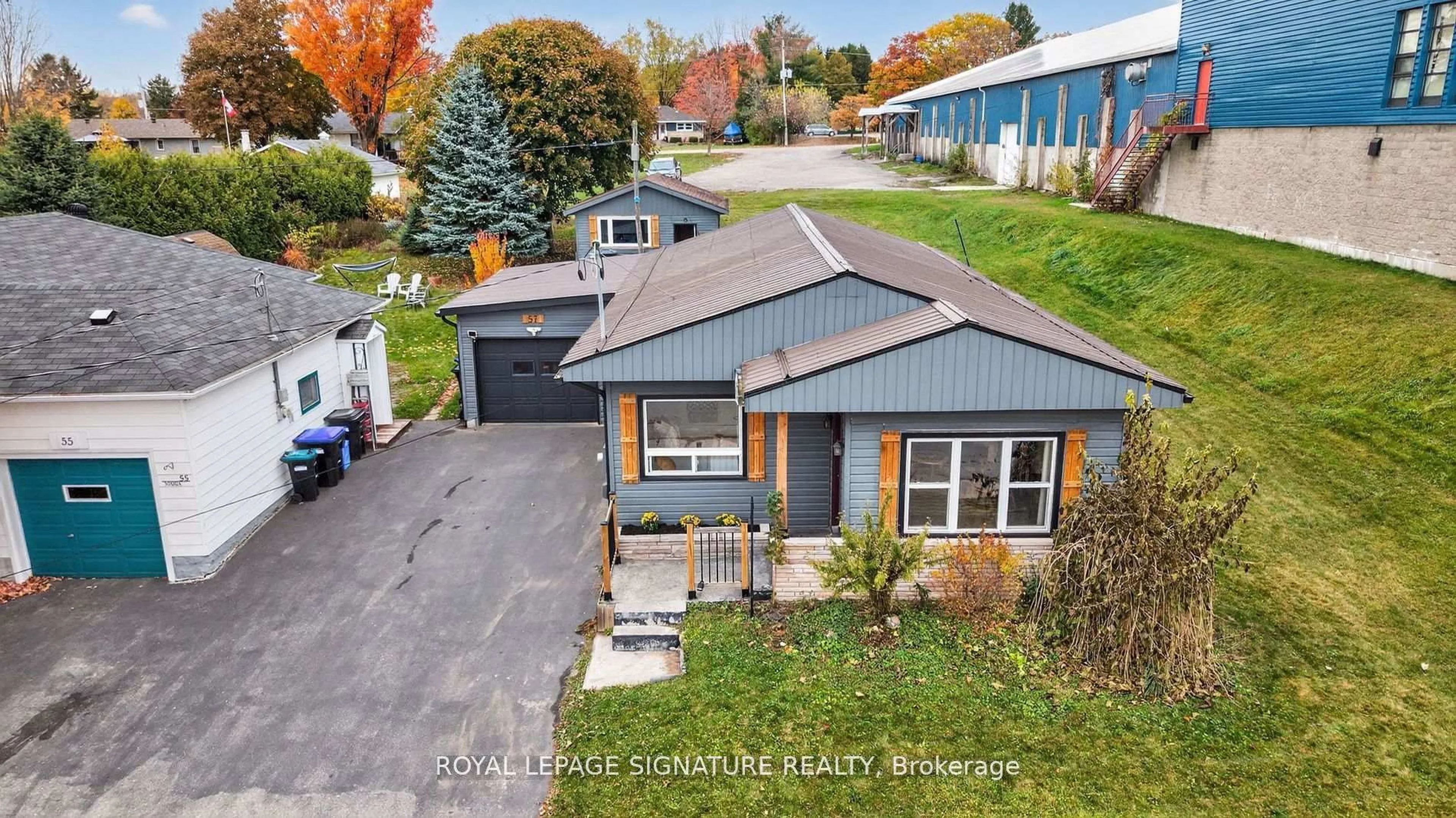 A pic from outside/outdoor area/front of a property/back of a property/a pic from drone, street for 57 Maria St, Penetanguishene Ontario L9M 1L3