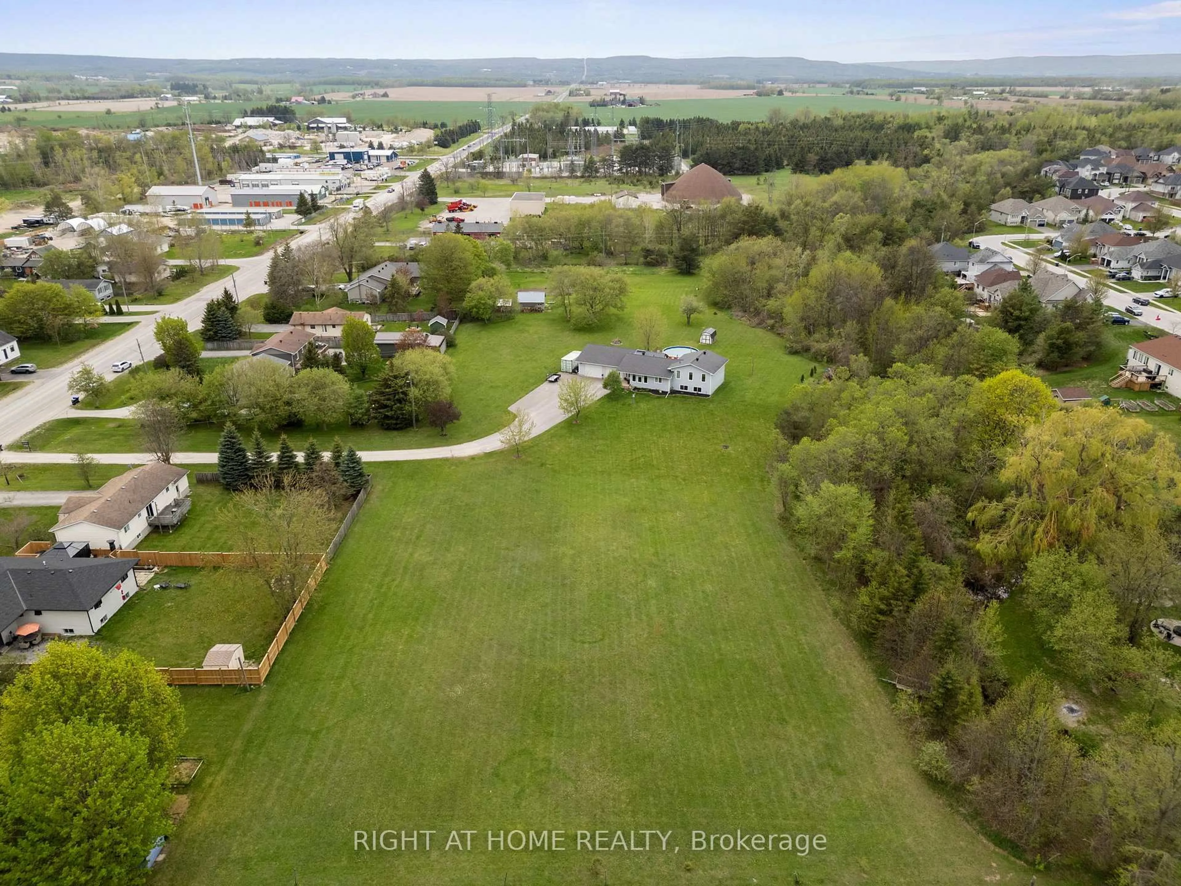 A pic from outside/outdoor area/front of a property/back of a property/a pic from drone, unknown for 7544 County Road 91 Rd, Clearview Ontario L0M 1S0