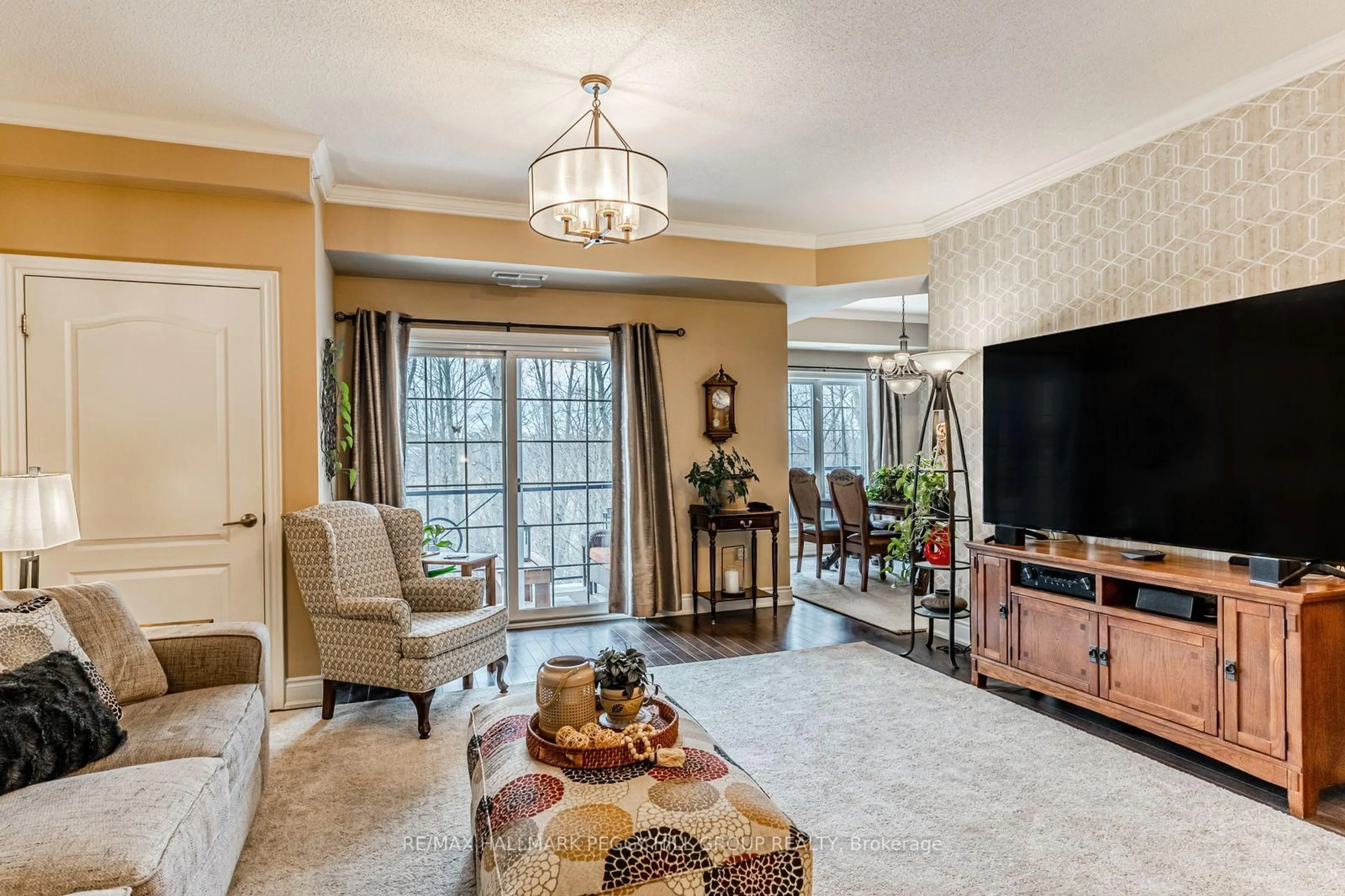 Living room with furniture, unknown for 44 Ferndale Dr #212, Barrie Ontario L4N 2V1