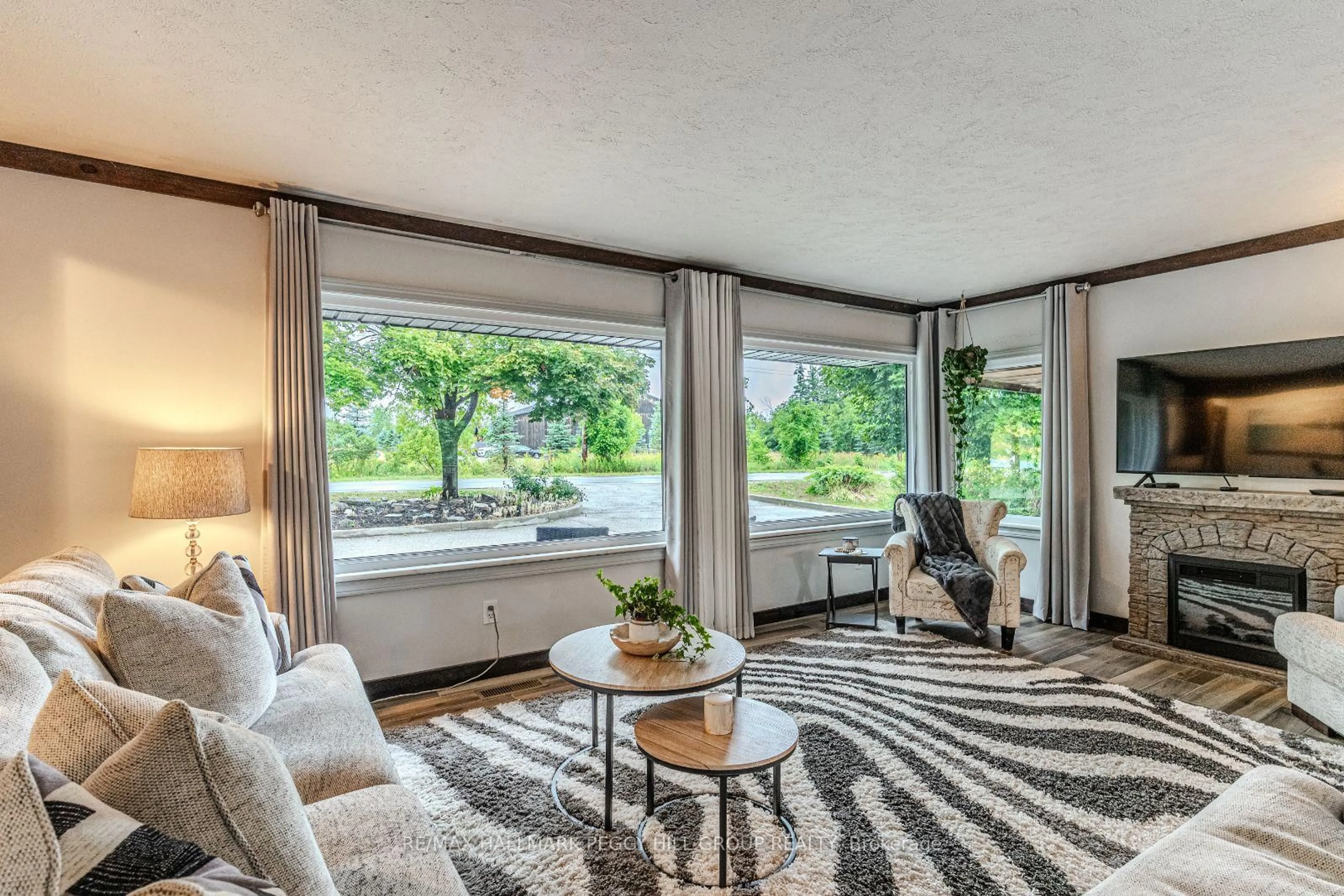 Living room with furniture, unknown for 2447 Ridge Rd, Oro-Medonte Ontario L0L 2L0