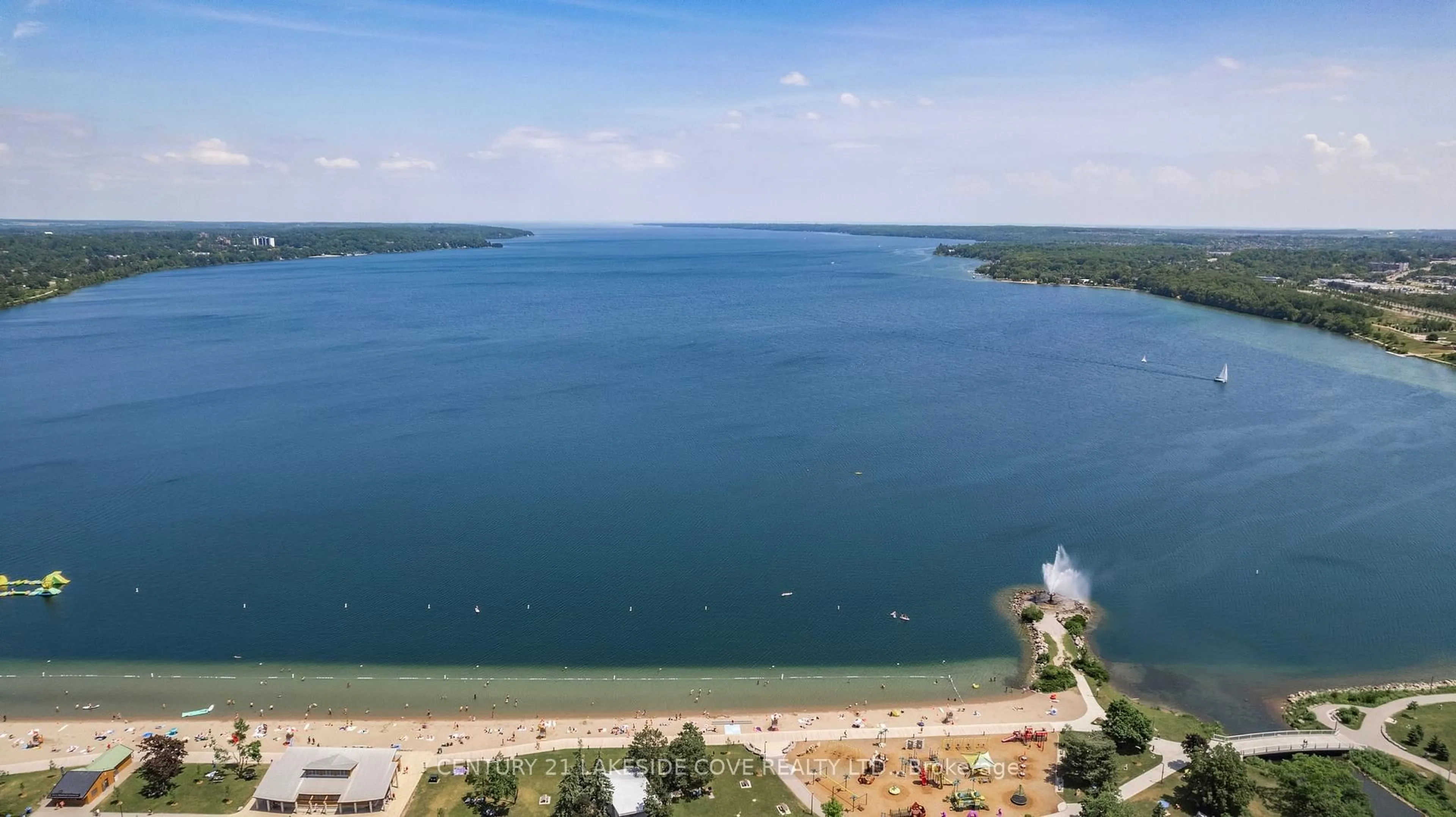 A pic from outside/outdoor area/front of a property/back of a property/a pic from drone, water/lake/river/ocean view for 75 Ellen St #711, Barrie Ontario L4N 7R6