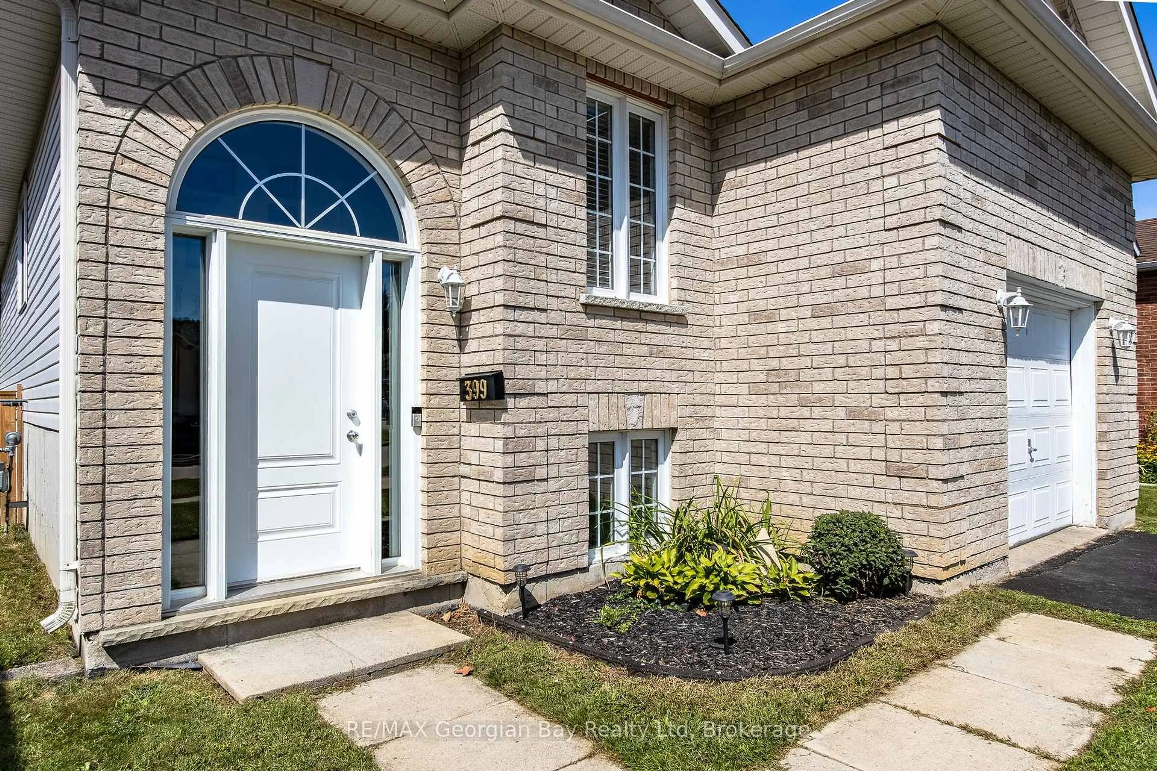 Home with brick exterior material, street for 399 Irwin St, Midland Ontario L4R 2V6