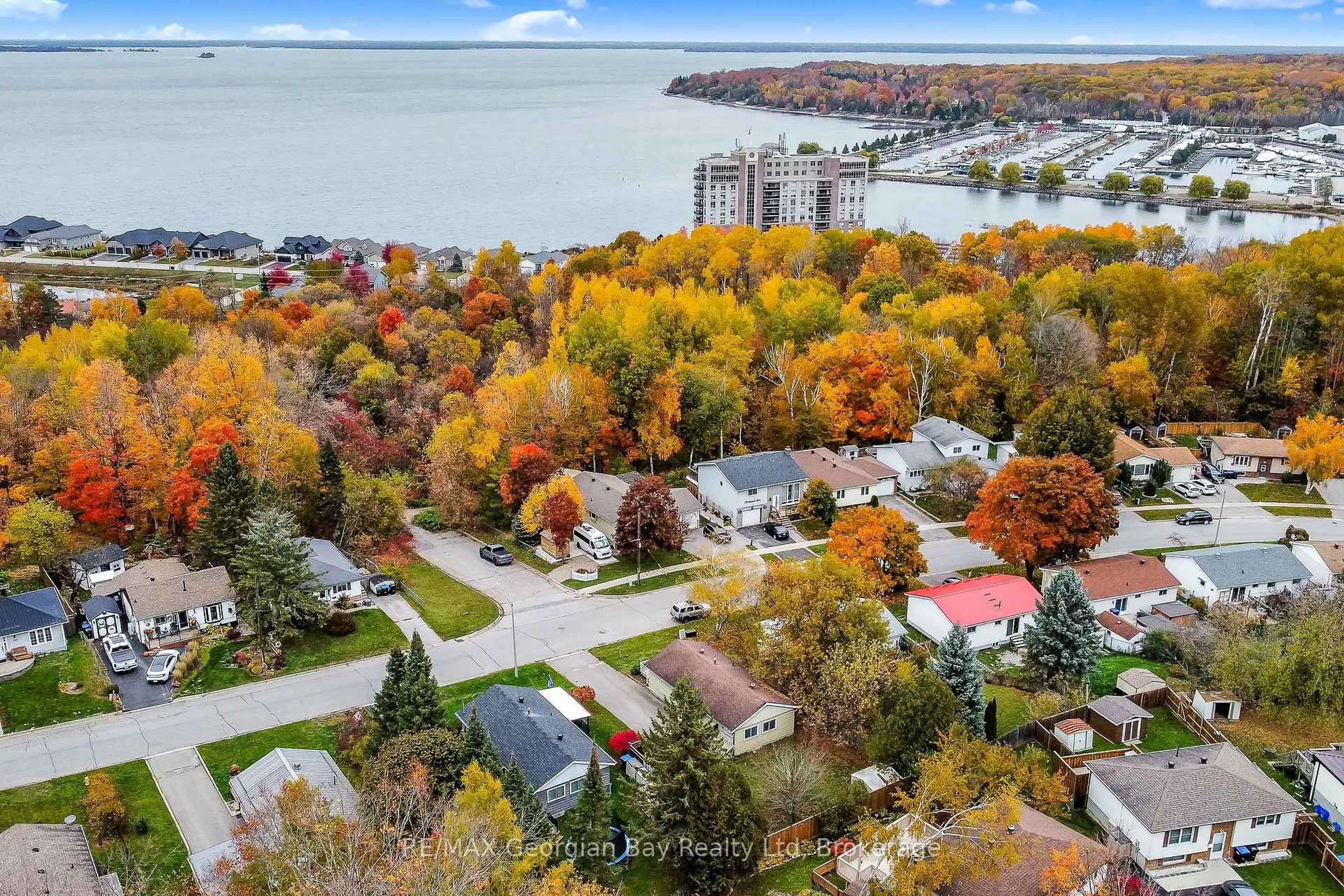 A pic from outside/outdoor area/front of a property/back of a property/a pic from drone, water/lake/river/ocean view for 771 Birchwood Dr, Midland Ontario L4R 2P8