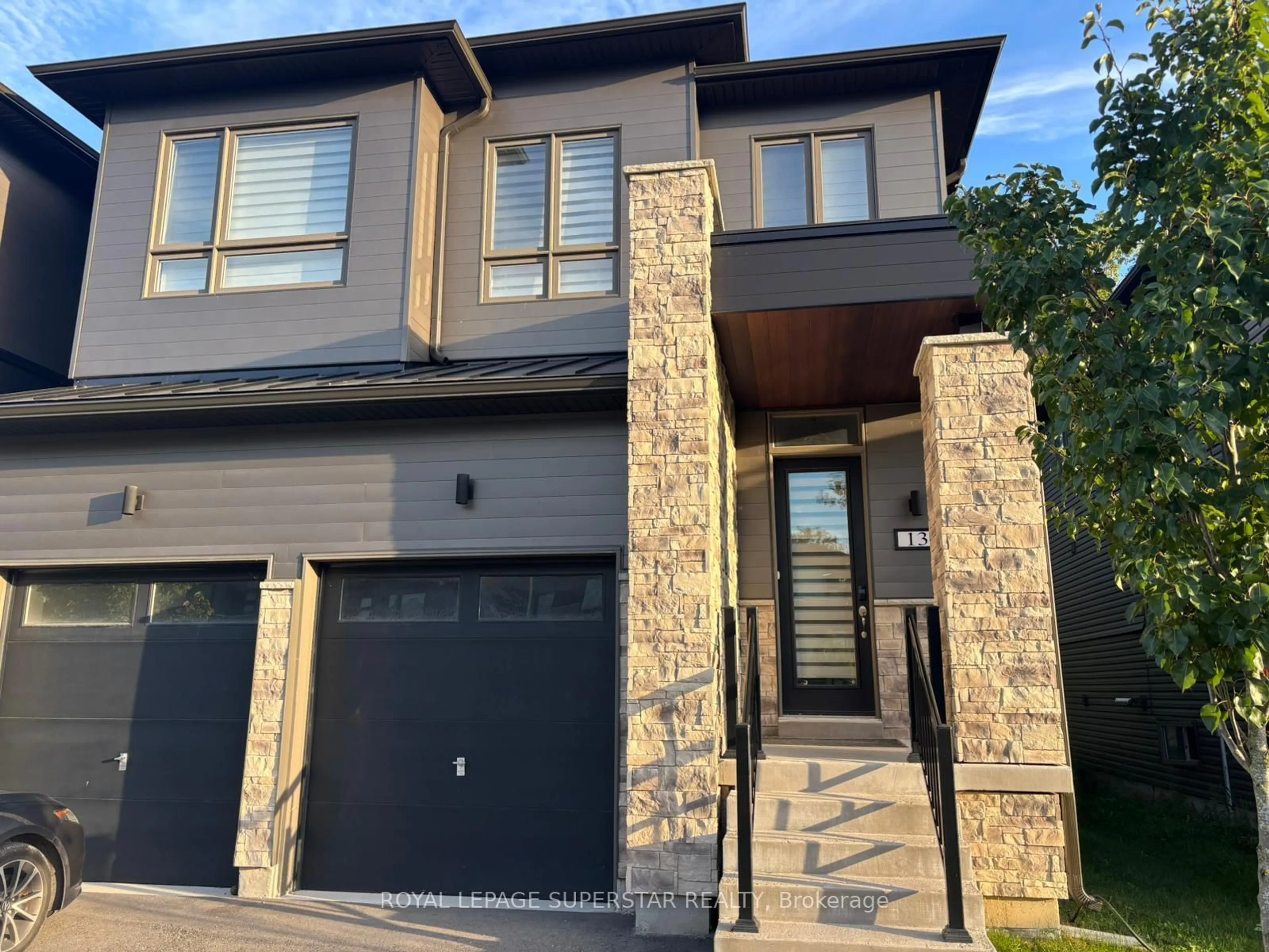 Home with brick exterior material, street for 13 Eberhardt Dr, Wasaga Beach Ontario L9Z 0K6