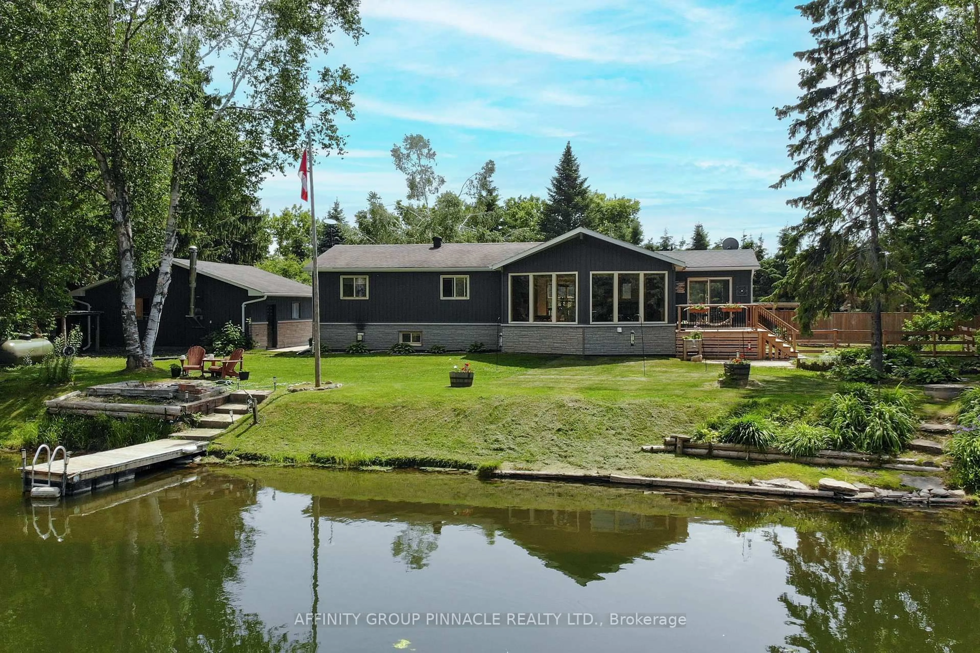 A pic from outside/outdoor area/front of a property/back of a property/a pic from drone, water/lake/river/ocean view for 1385 Furniss Dr, Ramara Ontario L0K 1B0