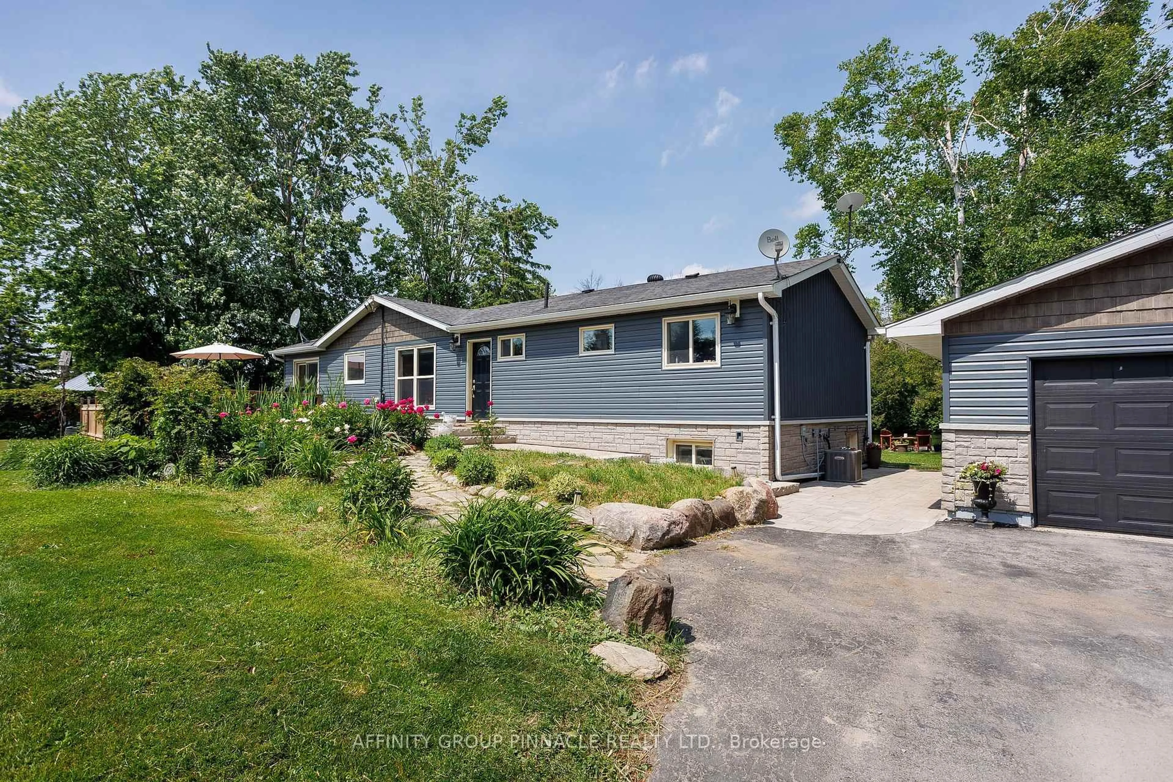 Home with vinyl exterior material, street for 1385 Furniss Dr, Ramara Ontario L0K 1B0