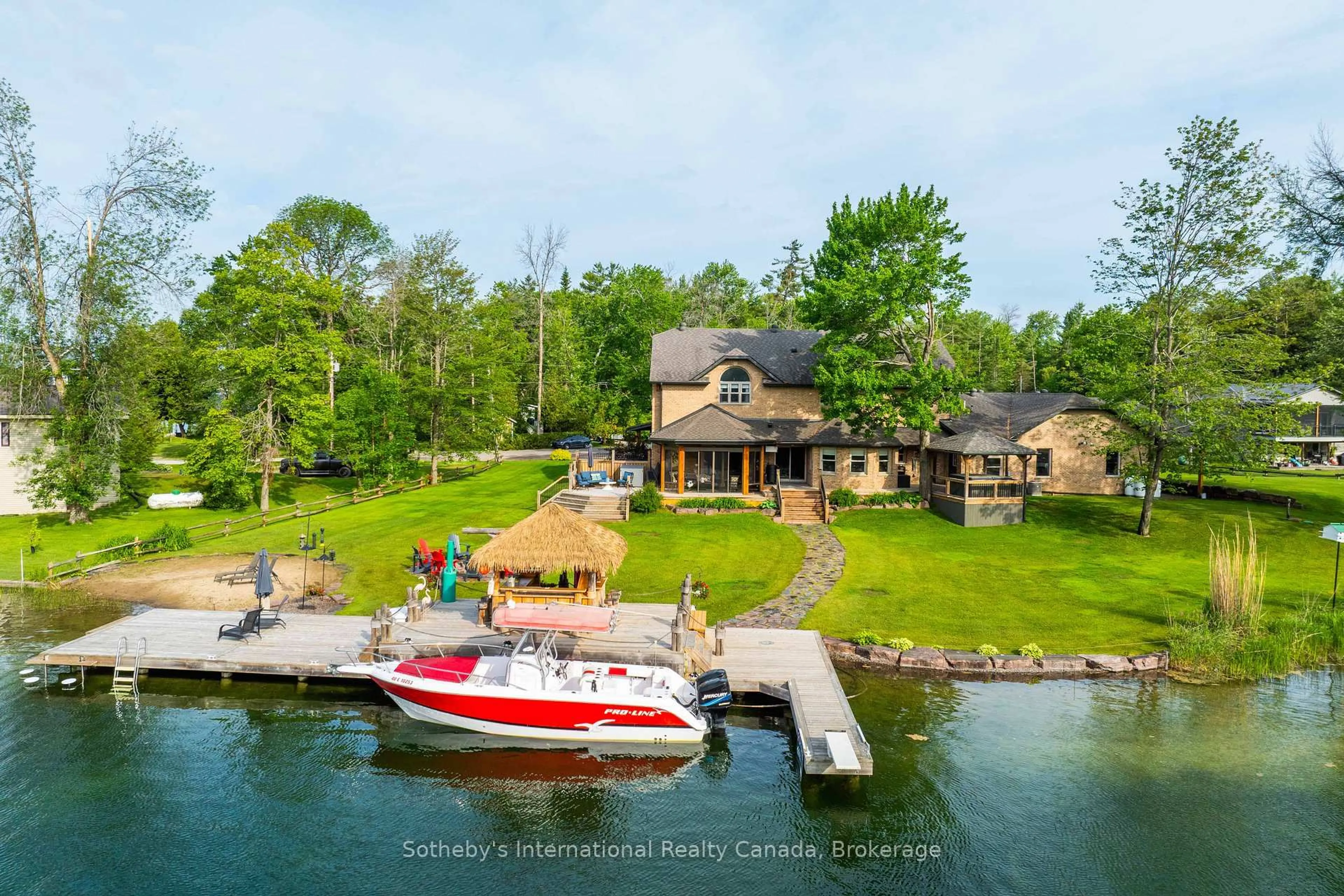A pic from outside/outdoor area/front of a property/back of a property/a pic from drone, water/lake/river/ocean view for 7583 Oak Point Rd, Ramara Ontario L0K 2B0