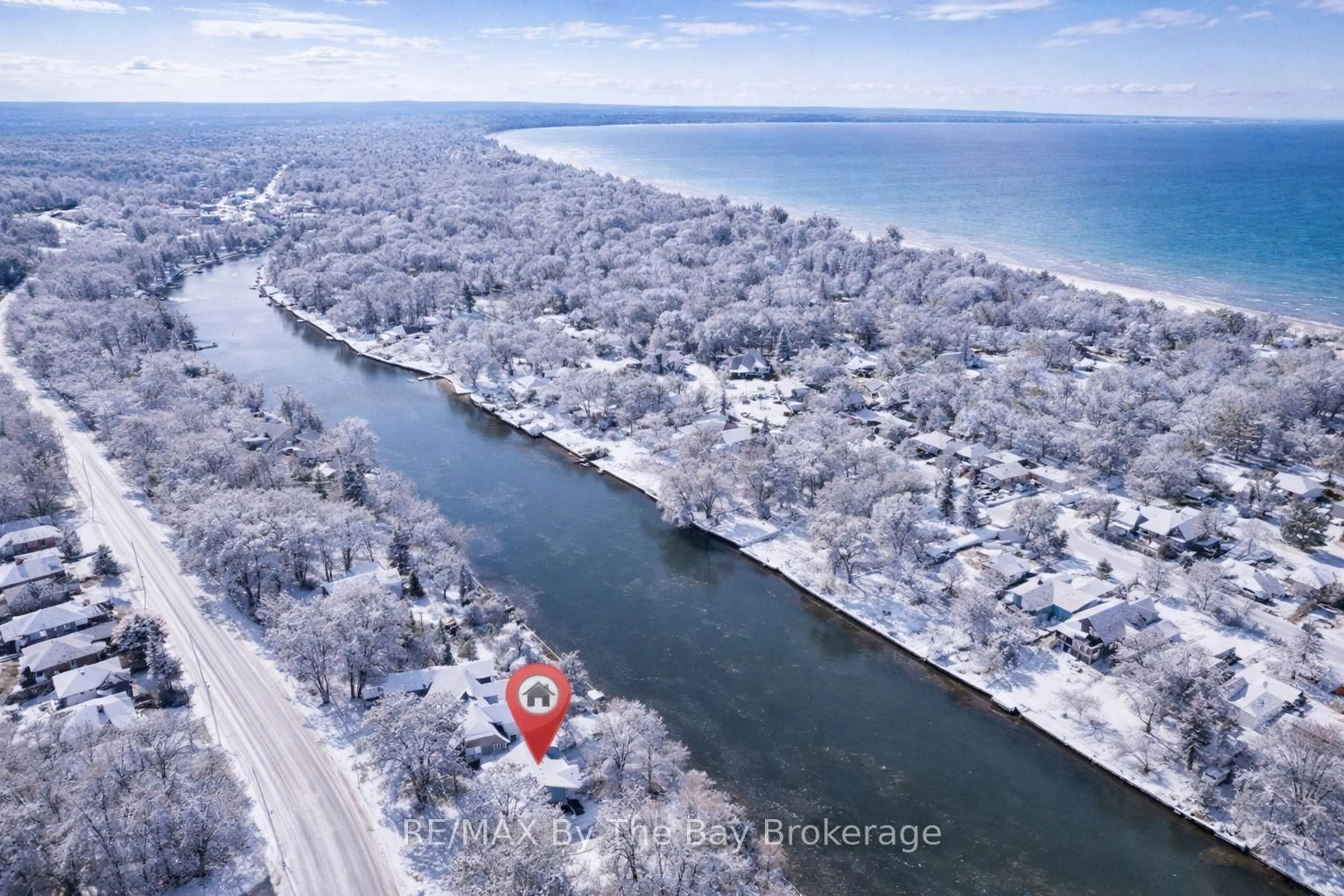 A pic from outside/outdoor area/front of a property/back of a property/a pic from drone, water/lake/river/ocean view for 1902 River Rd, Wasaga Beach Ontario L9Z 2W2