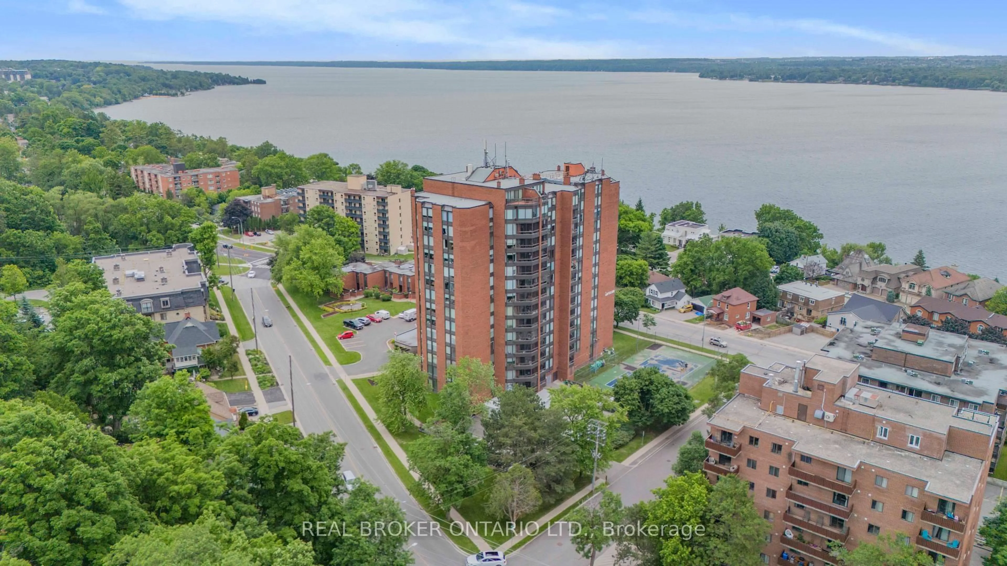 A pic from outside/outdoor area/front of a property/back of a property/a pic from drone, water/lake/river/ocean view for 181 Collier St #208, Barrie Ontario L4M 5L6