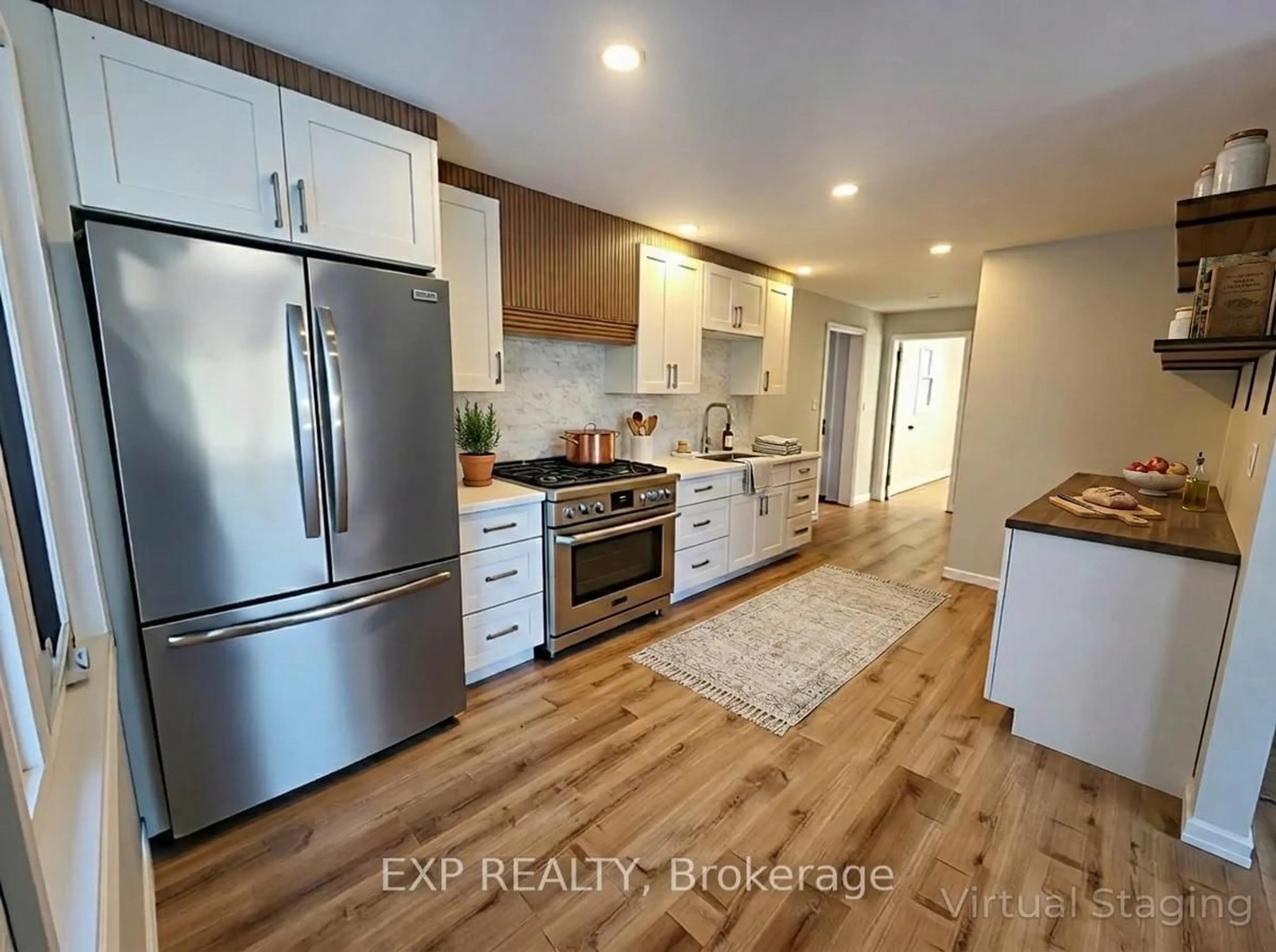 Open concept kitchen, wood/laminate floor for 71 Lakeshore Rd, Oro-Medonte Ontario L0L 2E0