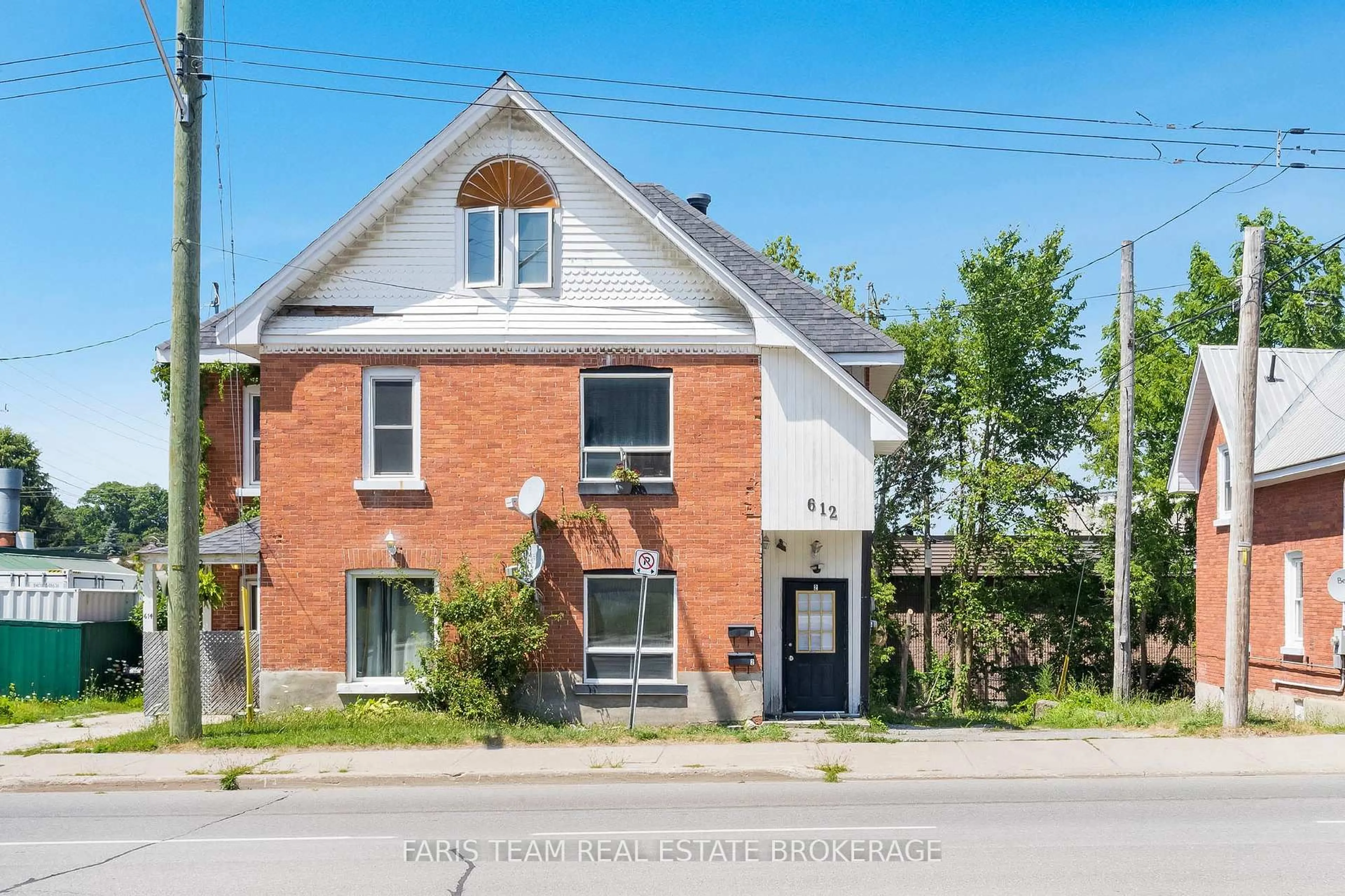 Home with brick exterior material, street for 612 Bay St, Midland Ontario L4R 1L6