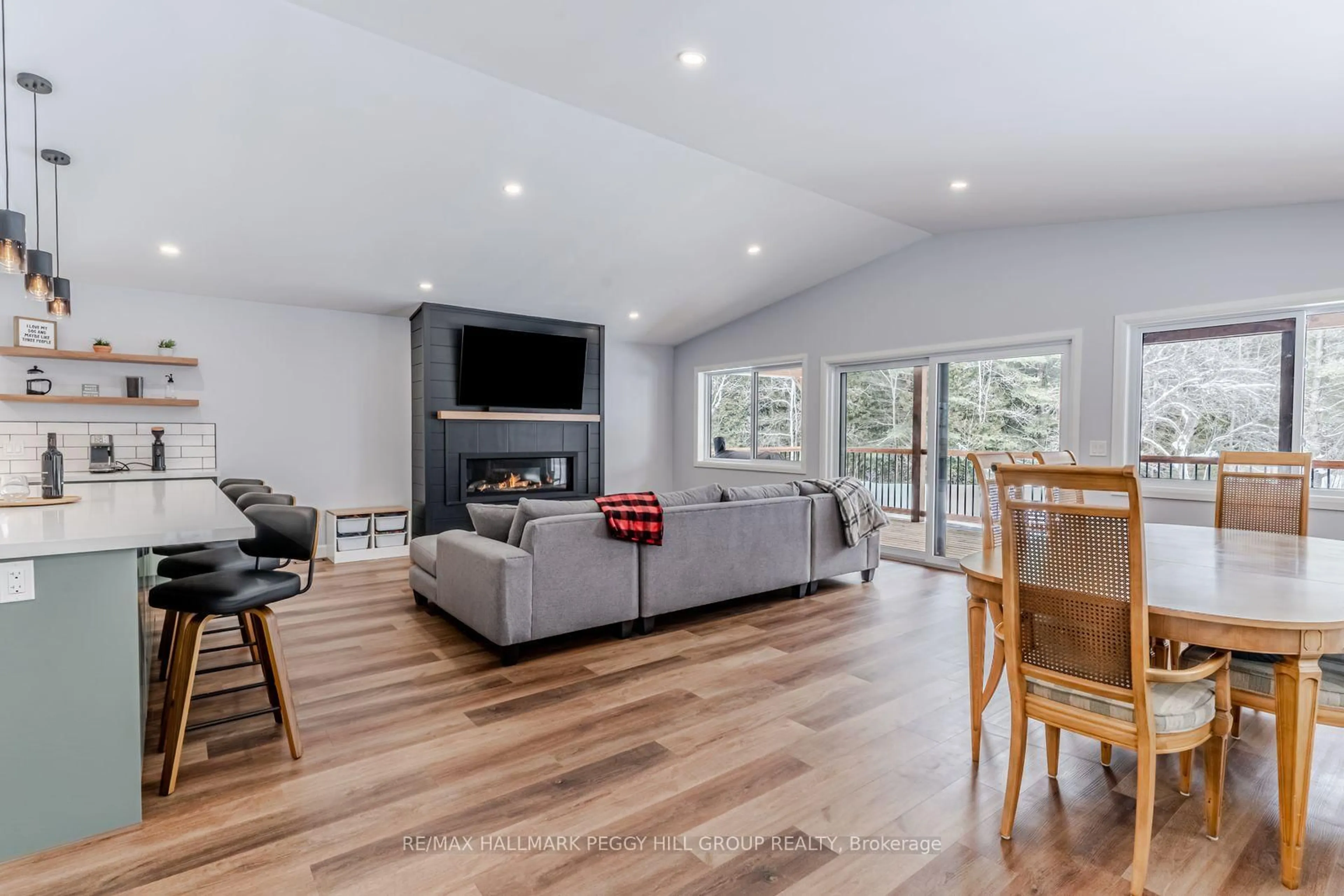 Living room with furniture, wood/laminate floor for 780 Marshall Rd, Tiny Ontario L0K 2E1