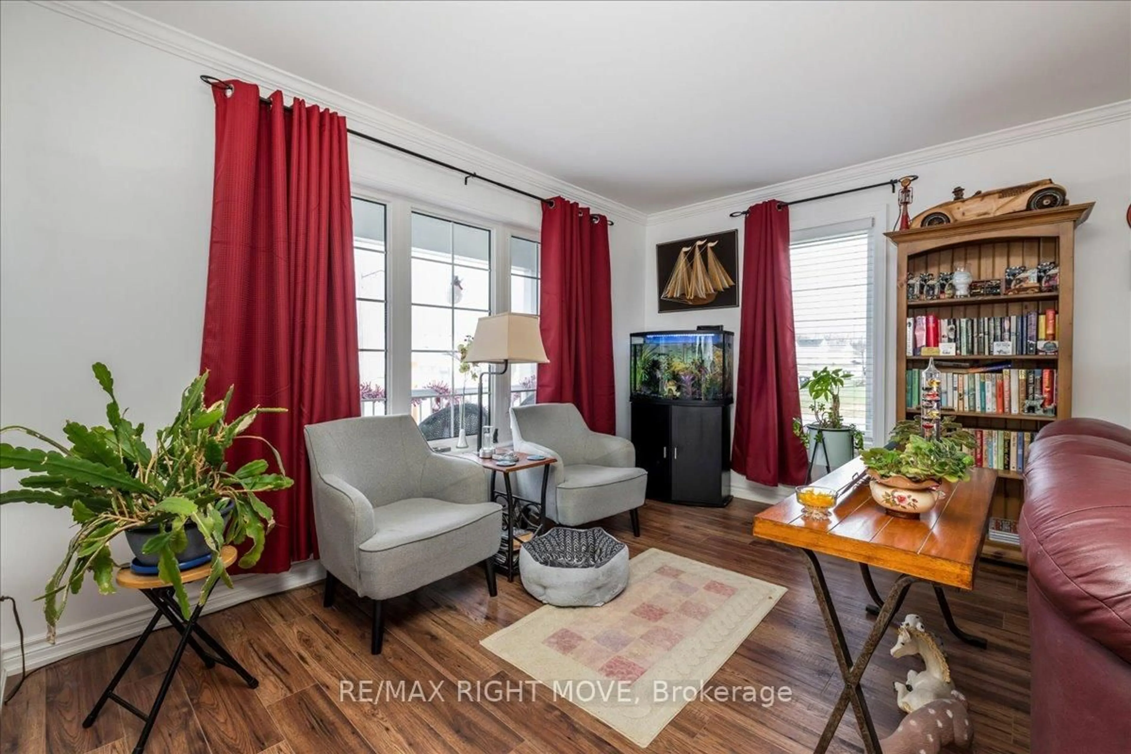 Living room with furniture, wood/laminate floor for 1 Sinclair Cres, Ramara Ontario L3V 6H7