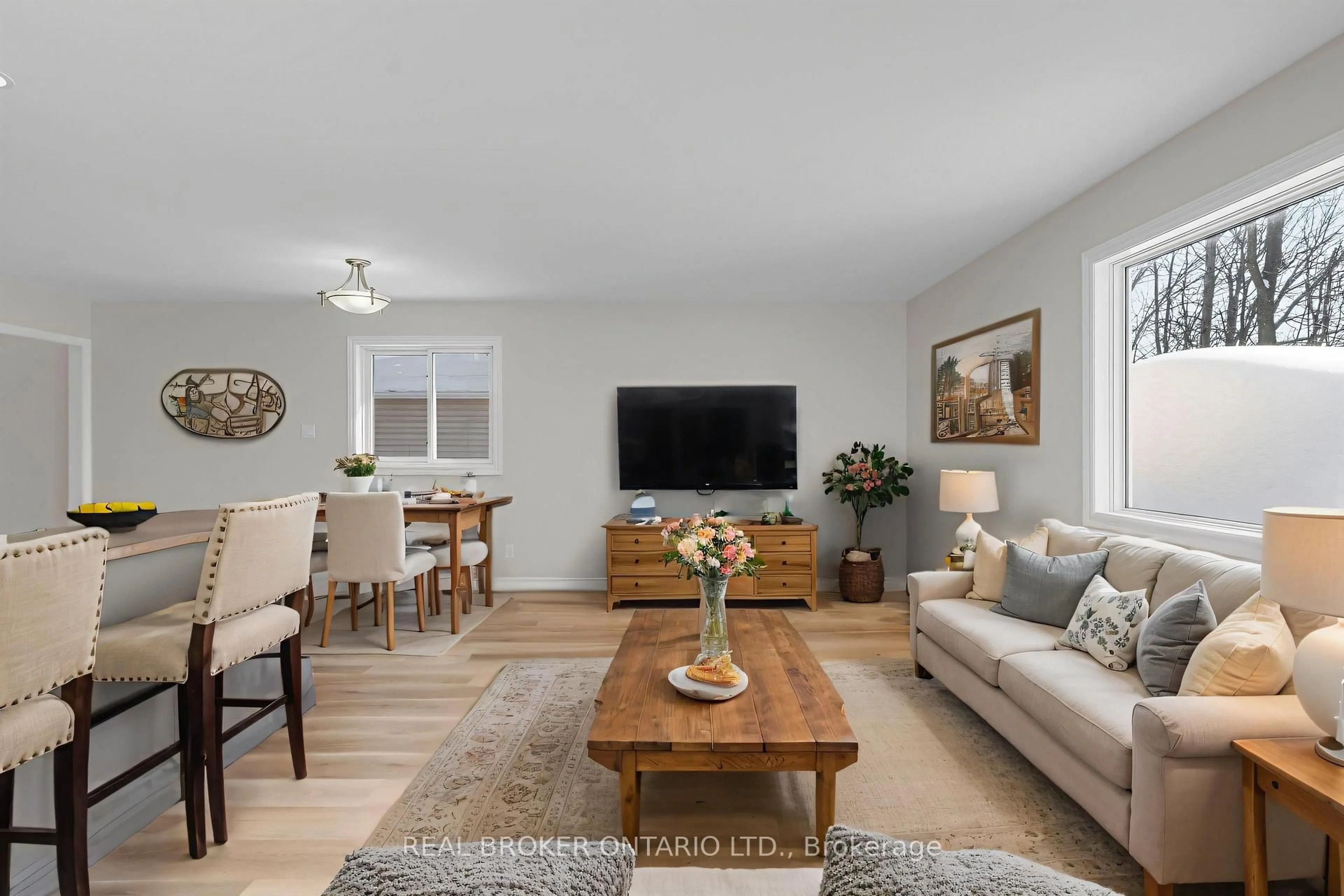 Living room with furniture, wood/laminate floor for 3392 Lee Ave, Severn Ontario L0K 1G0