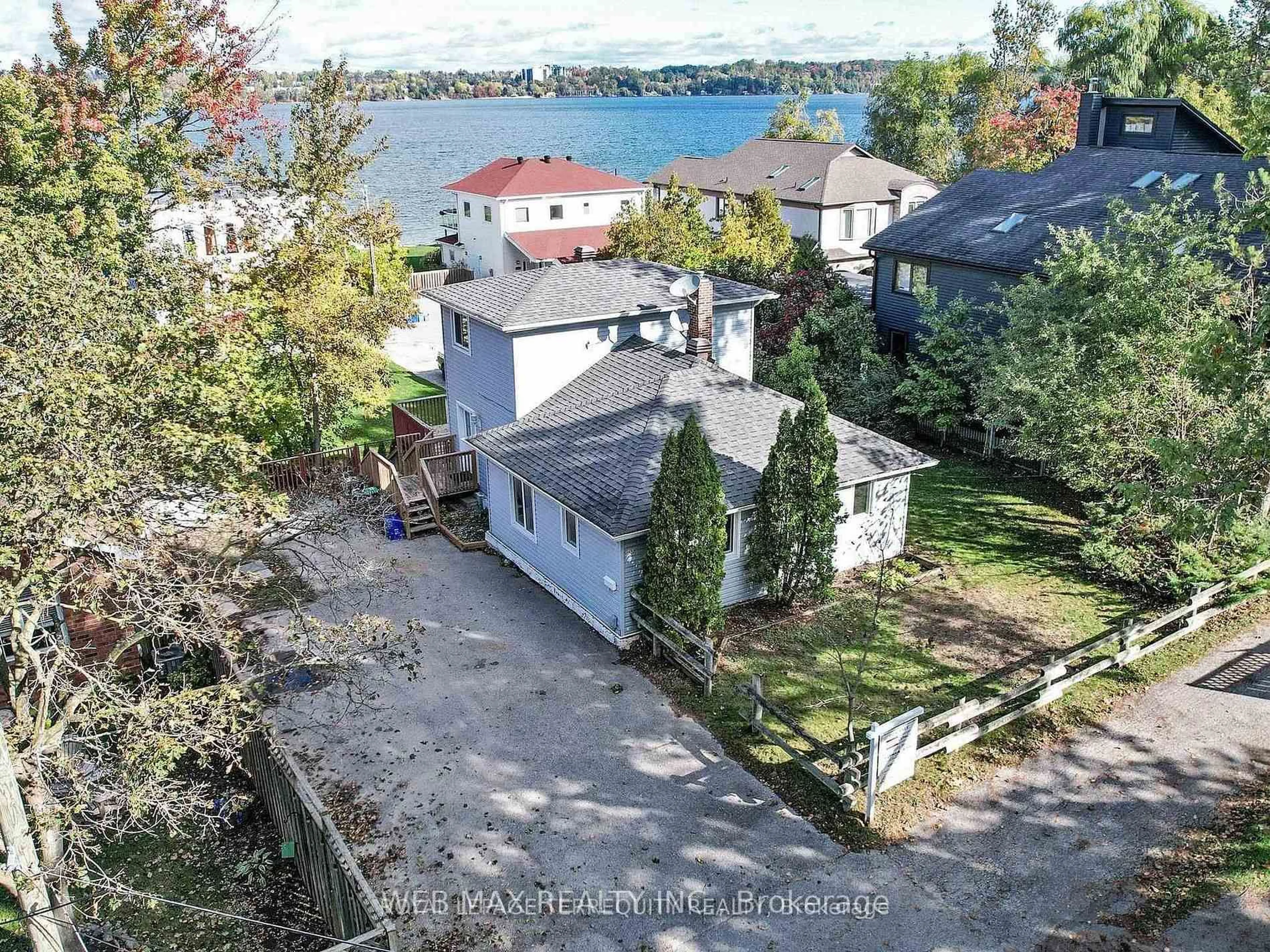 A pic from outside/outdoor area/front of a property/back of a property/a pic from drone, water/lake/river/ocean view for 40 Brennan Ave, Barrie Ontario L4N 3X3
