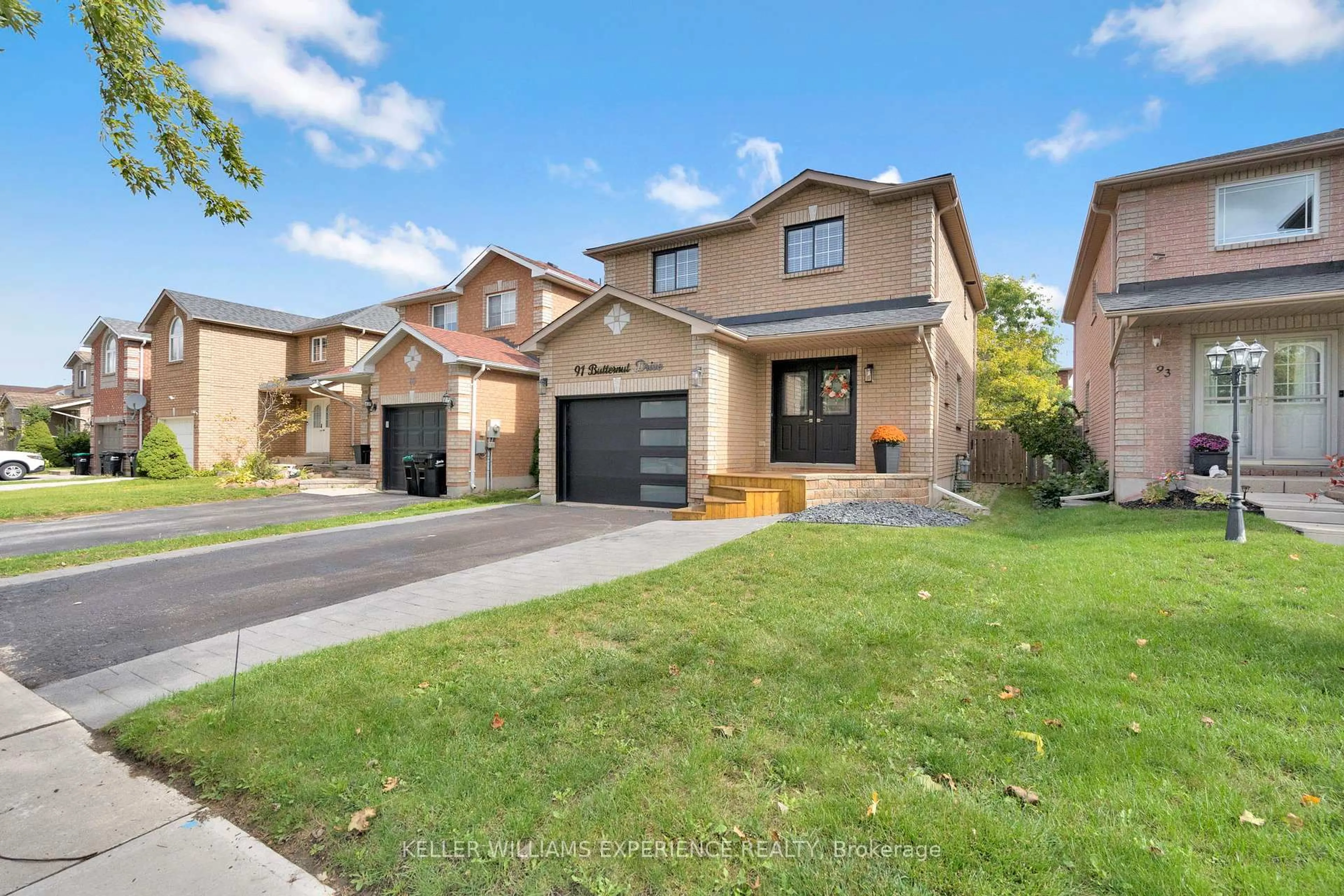 Home with brick exterior material, street for 91 Butternut Dr, Barrie Ontario L4N 9Z7